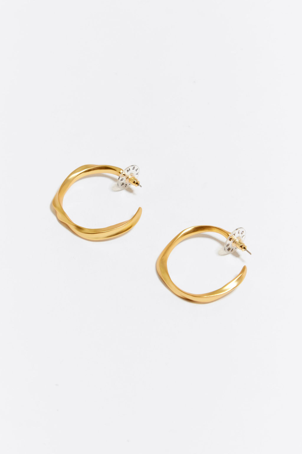 Maxi golden irregular hoop earrings