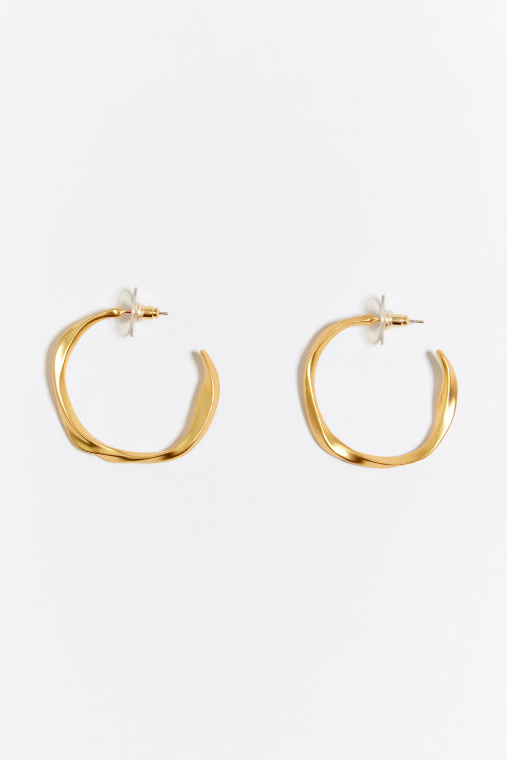 Maxi golden irregular hoop earrings
