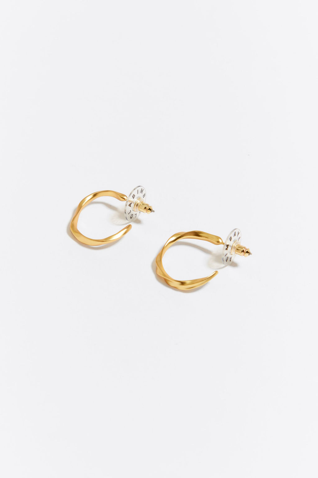 Golden irregular hoop earrings