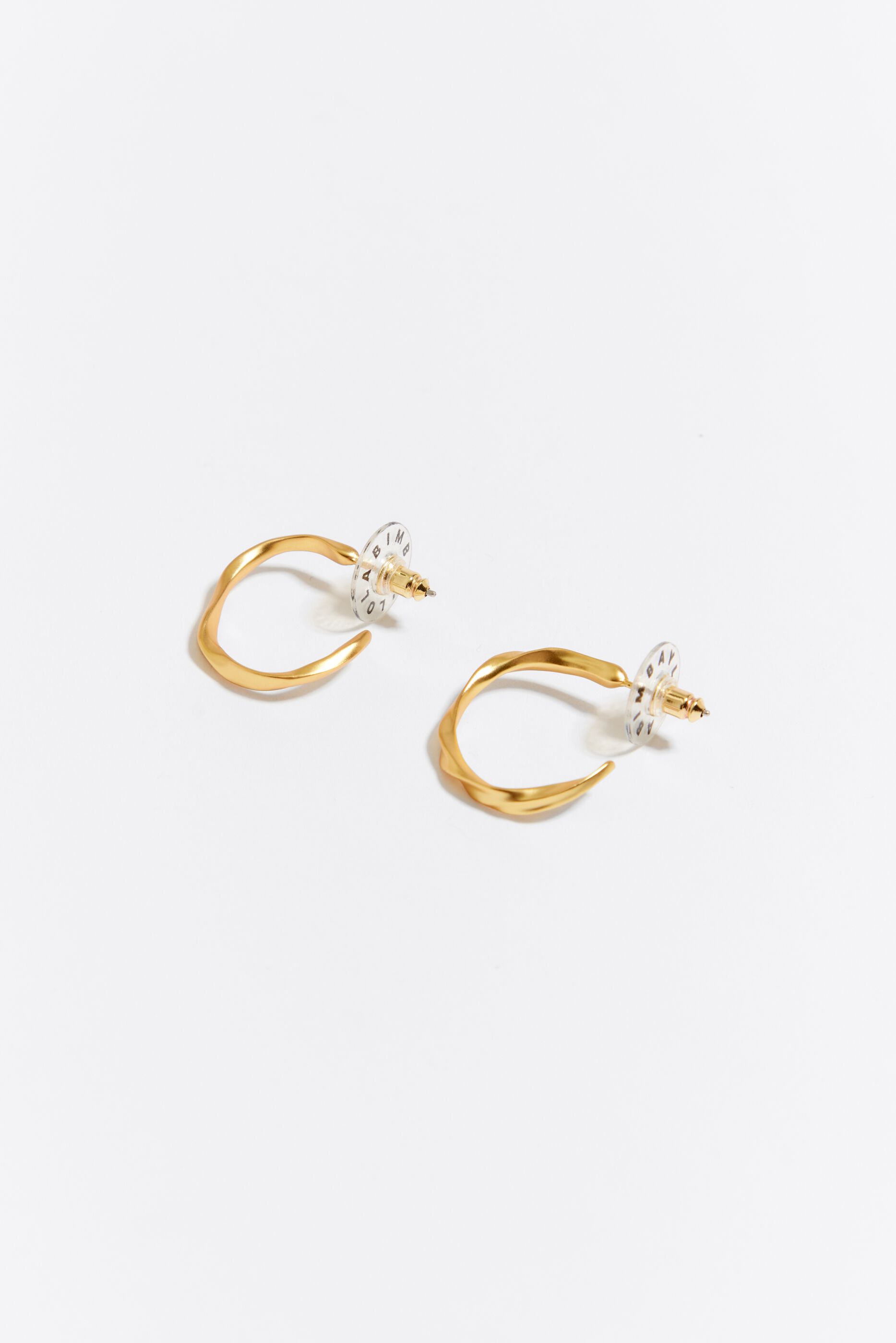 Golden irregular hoop earrings