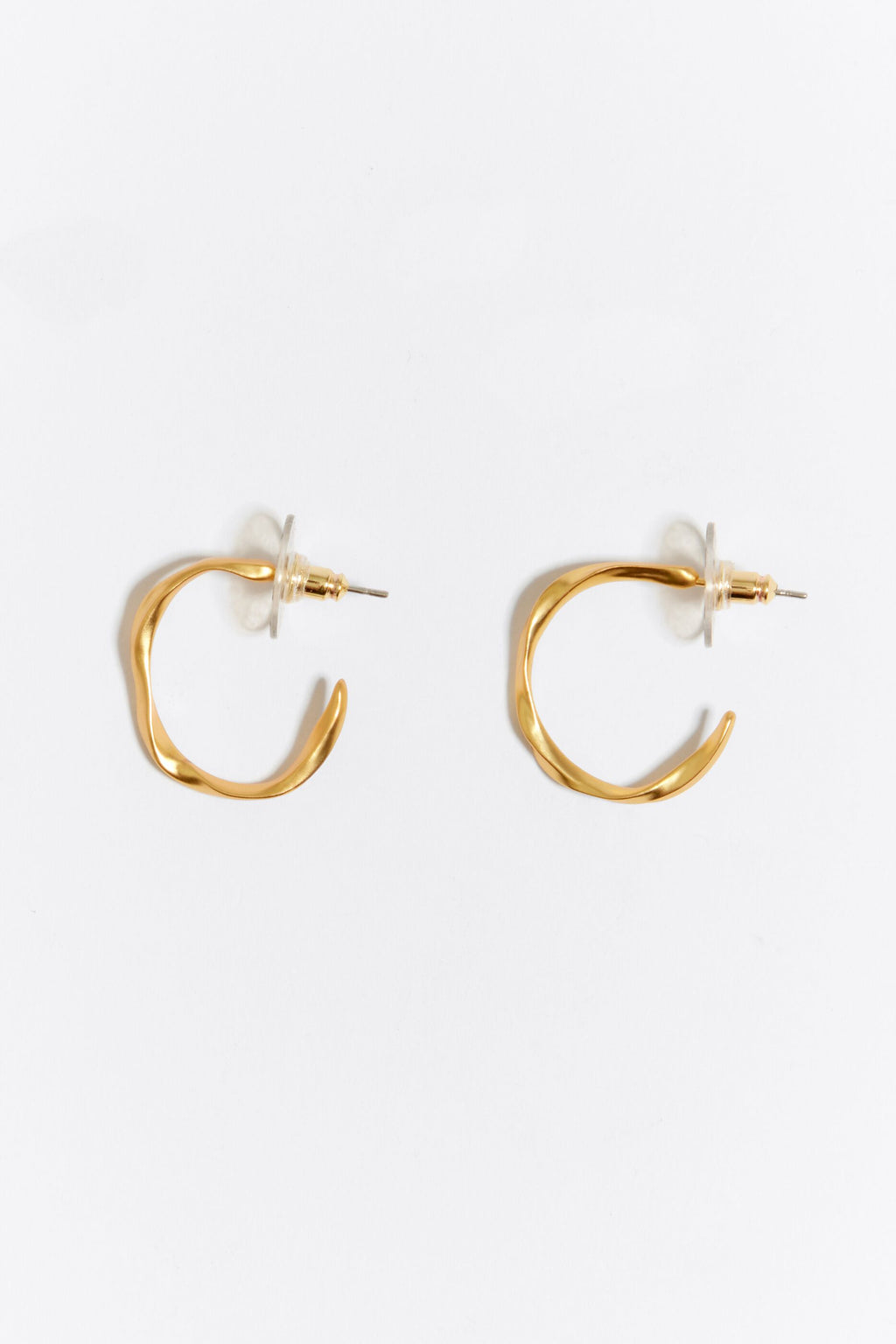 Golden irregular hoop earrings