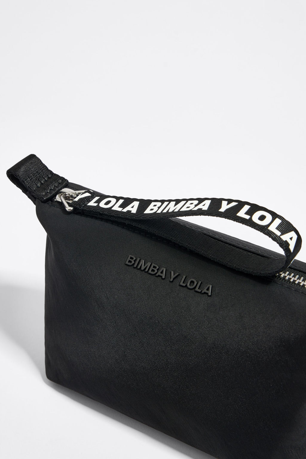 Small black nylon trapezium make-up case