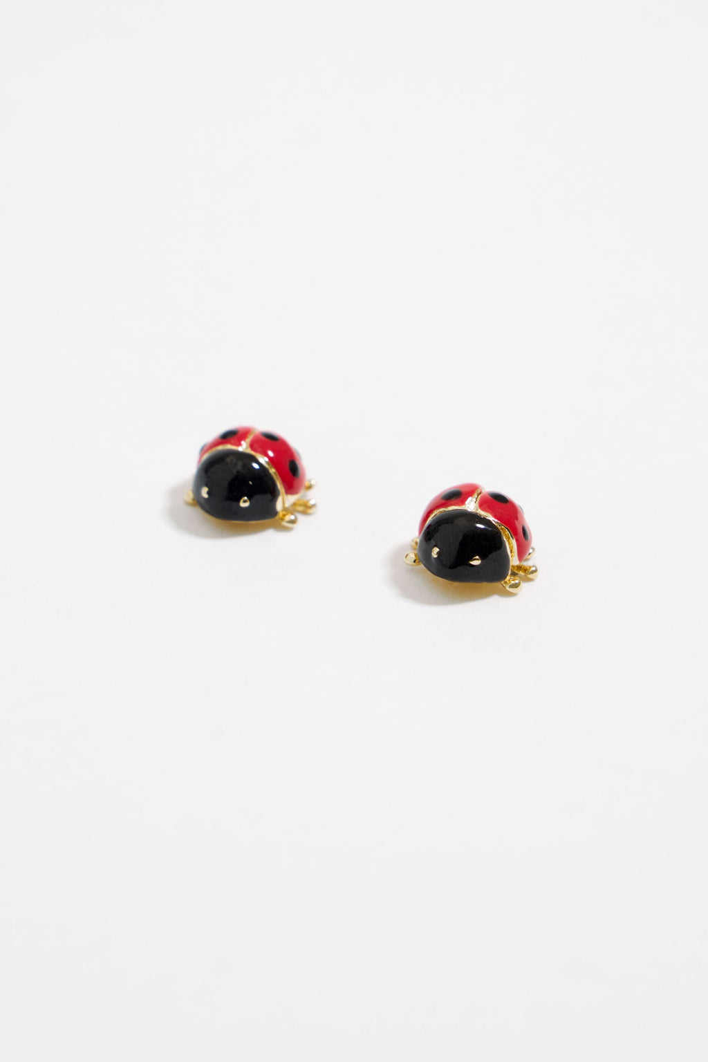 Mini golden ladybug earrings