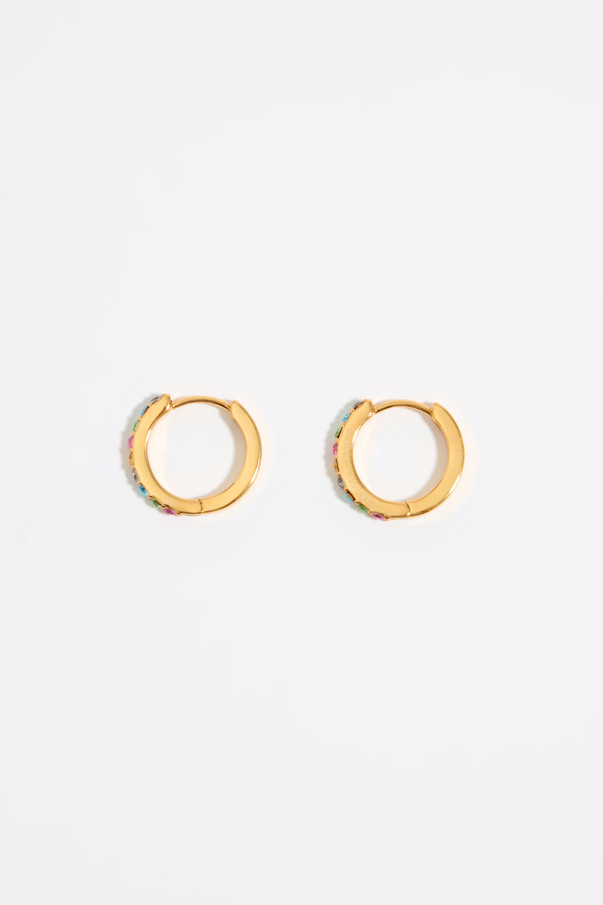 Golden hoop earrings with crystals