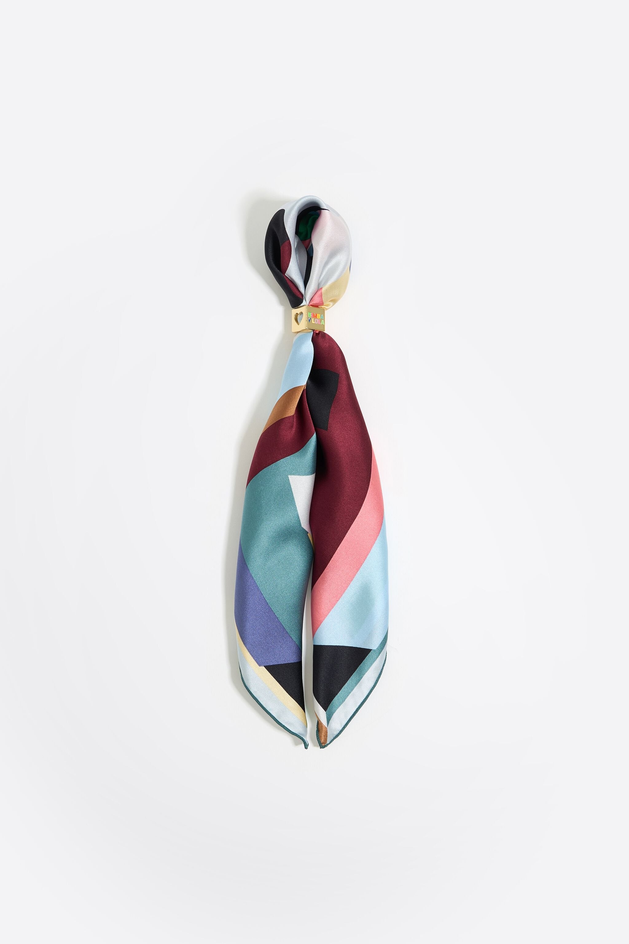 Geometric logo and metal dice scarf charm