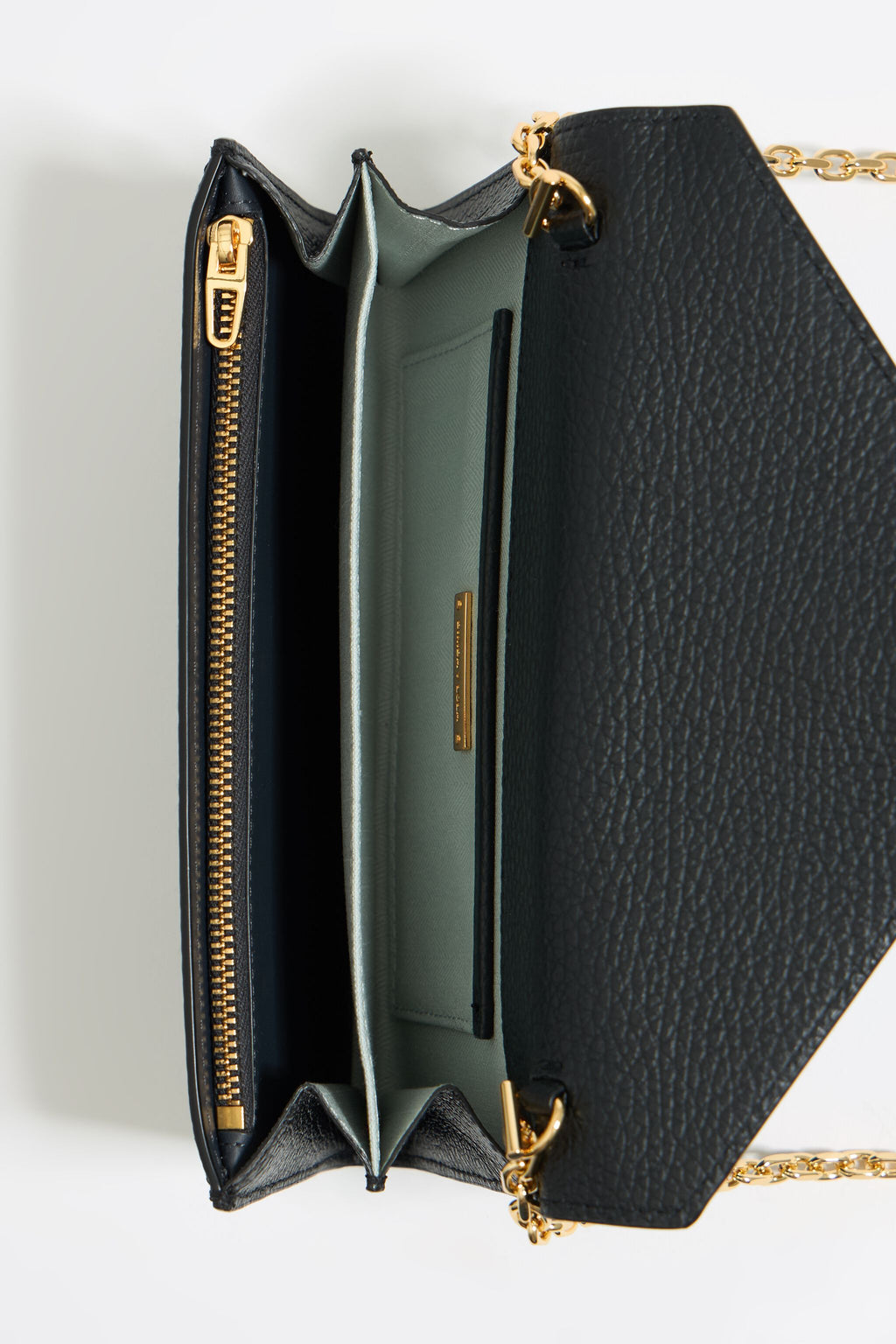 Mini black leather flap bag