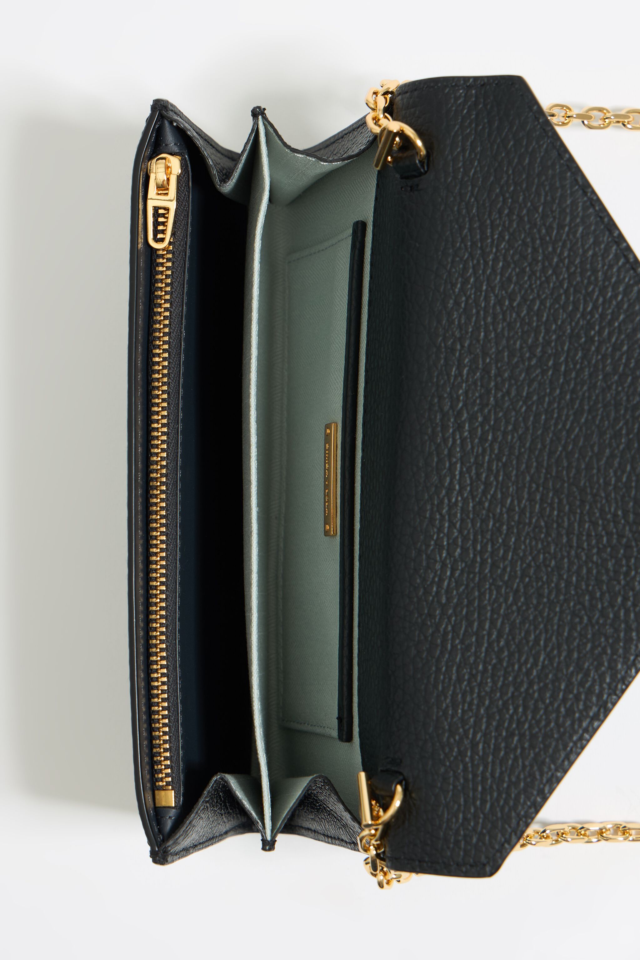 Mini black leather flap bag