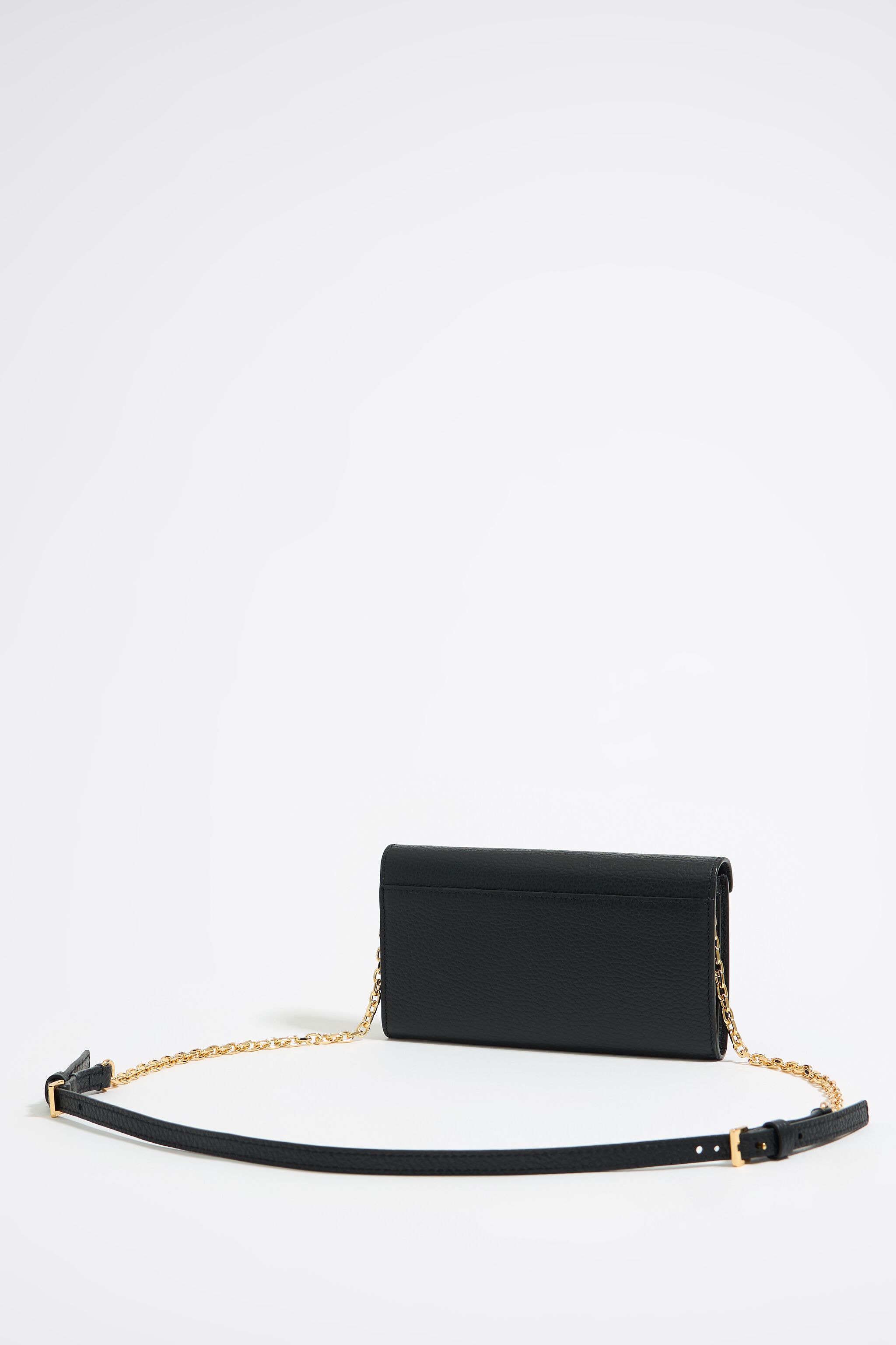 Mini black leather flap bag