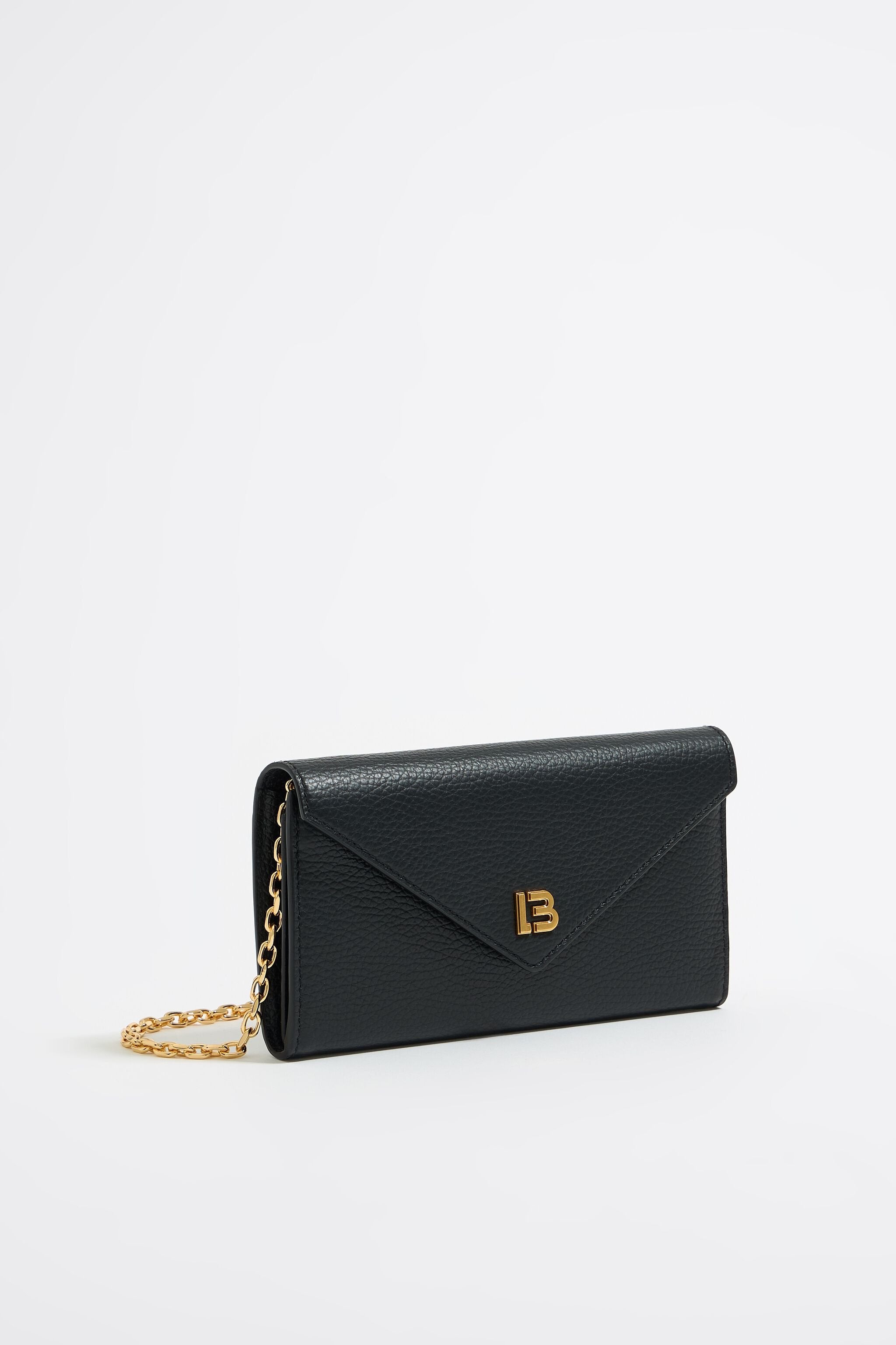 Mini black leather flap bag