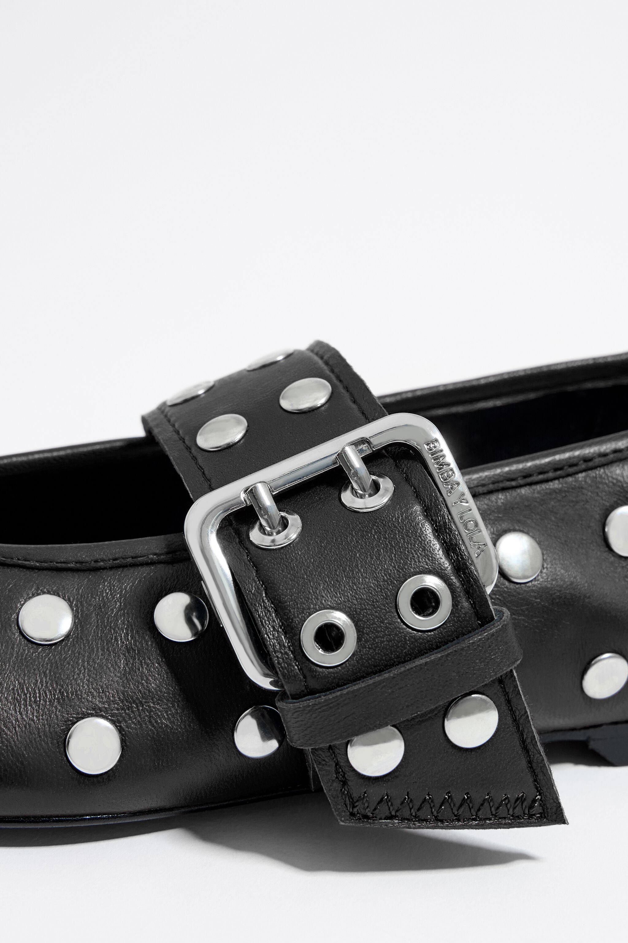 Studded black leather ballerina