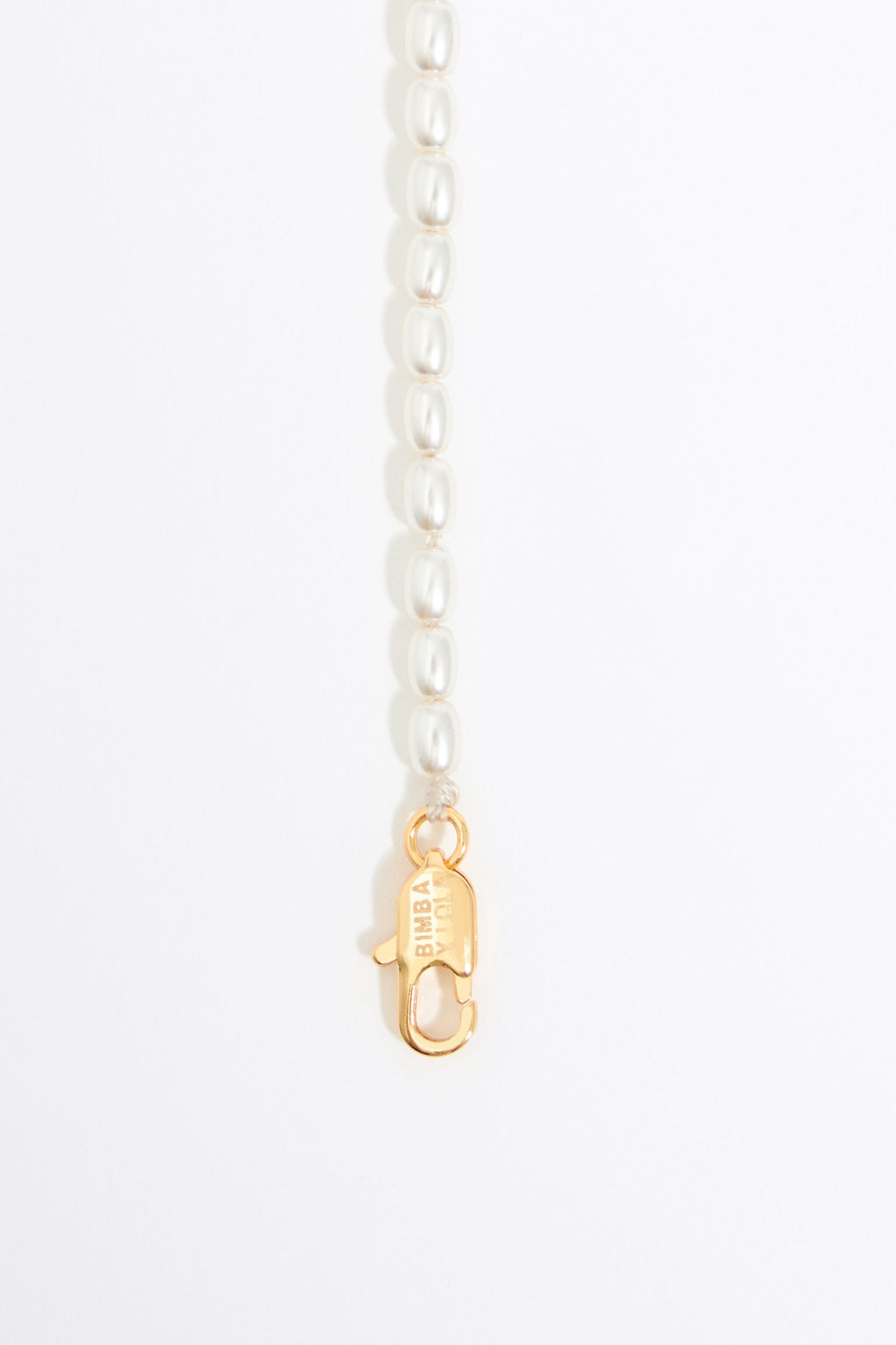 Pearl necklace with butterfly, ladybug and bee