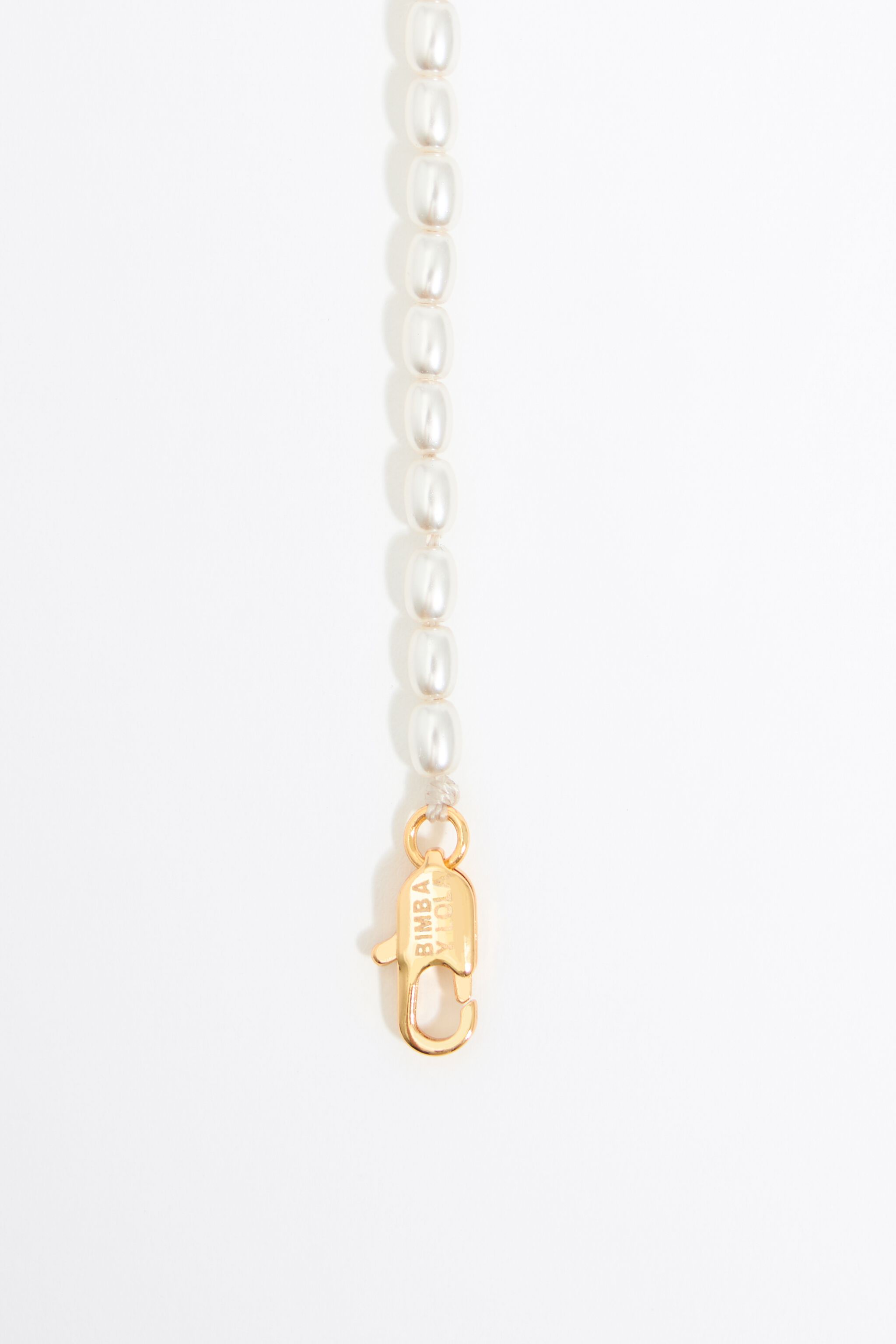 Pearl necklace with butterfly, ladybug and bee