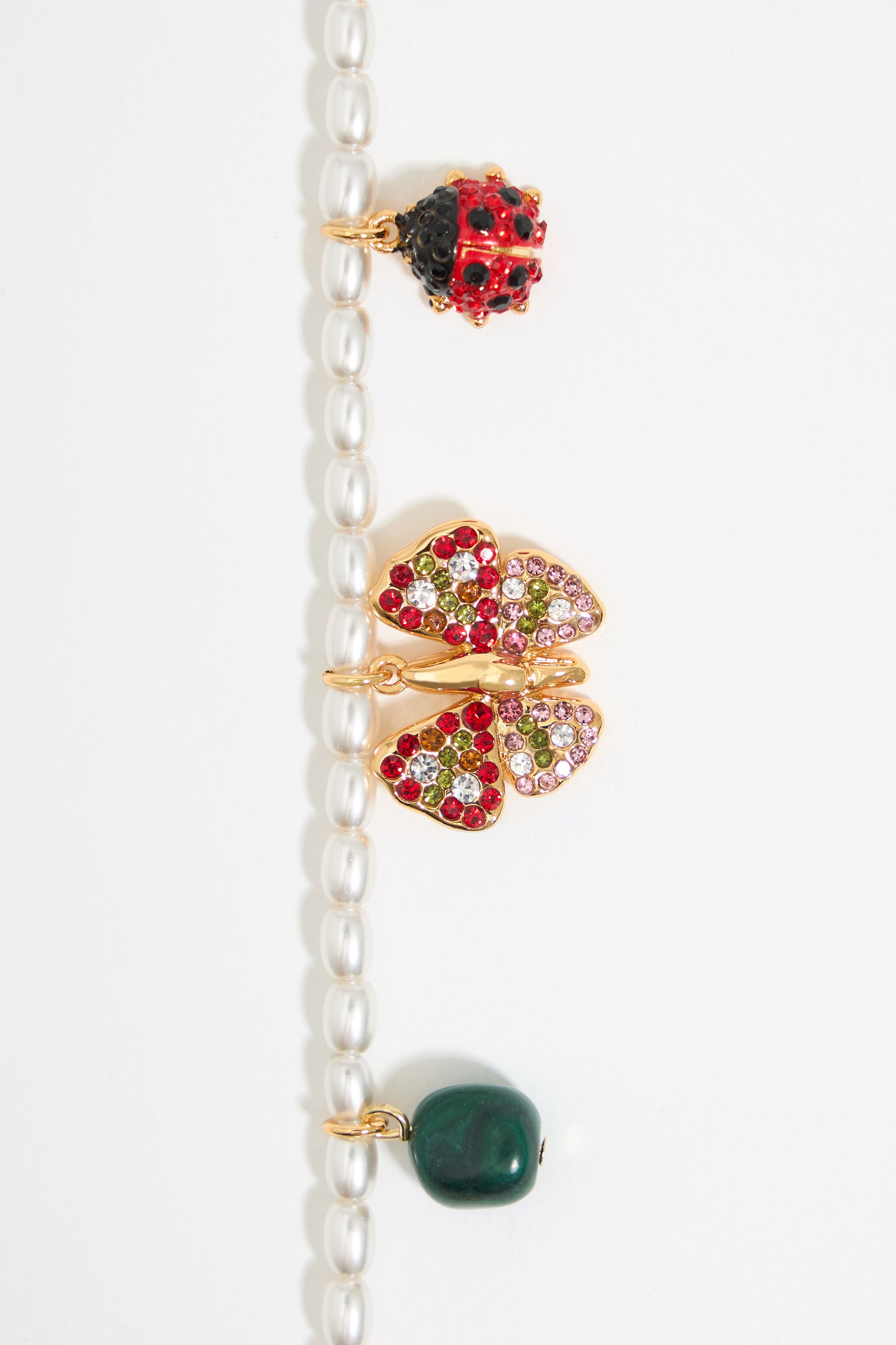 Pearl bracelet with butterfly, ladybug and bee