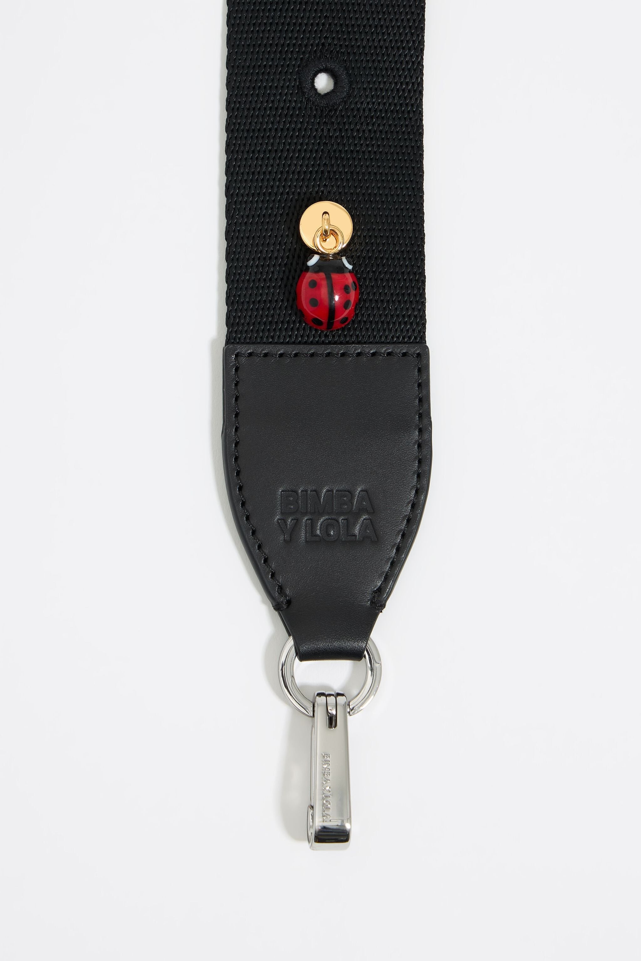 Red glass ladybug bag charm