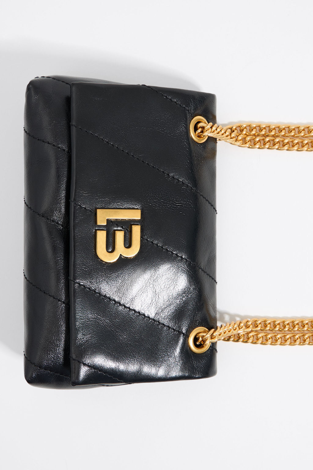 Mini black leather flap bag