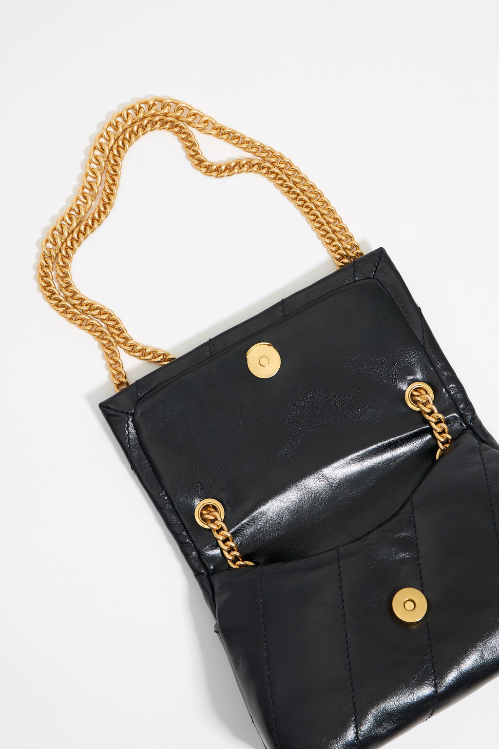 Mini black leather flap bag
