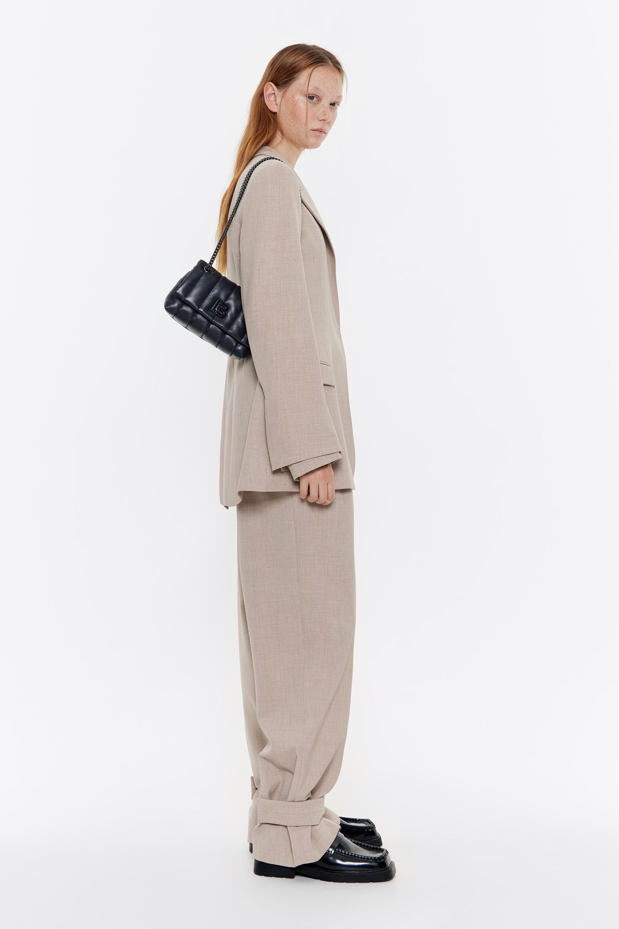 Mini black leather flap bag