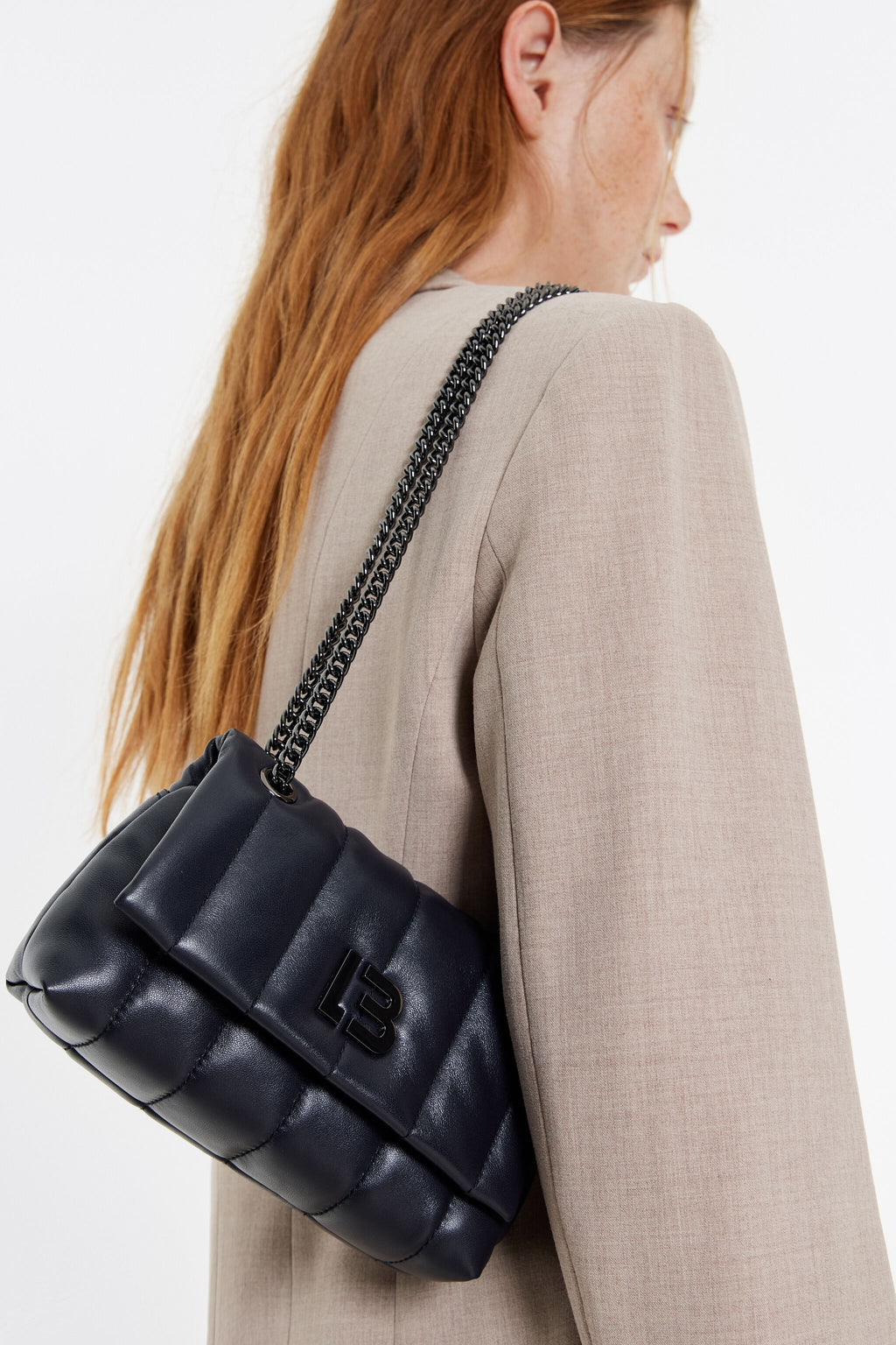 Mini black leather flap bag