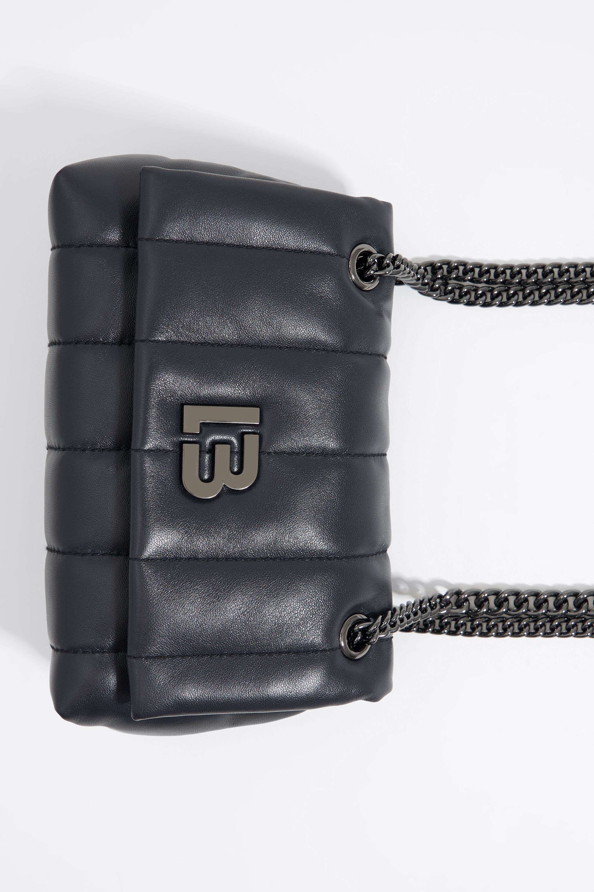 Mini black leather flap bag