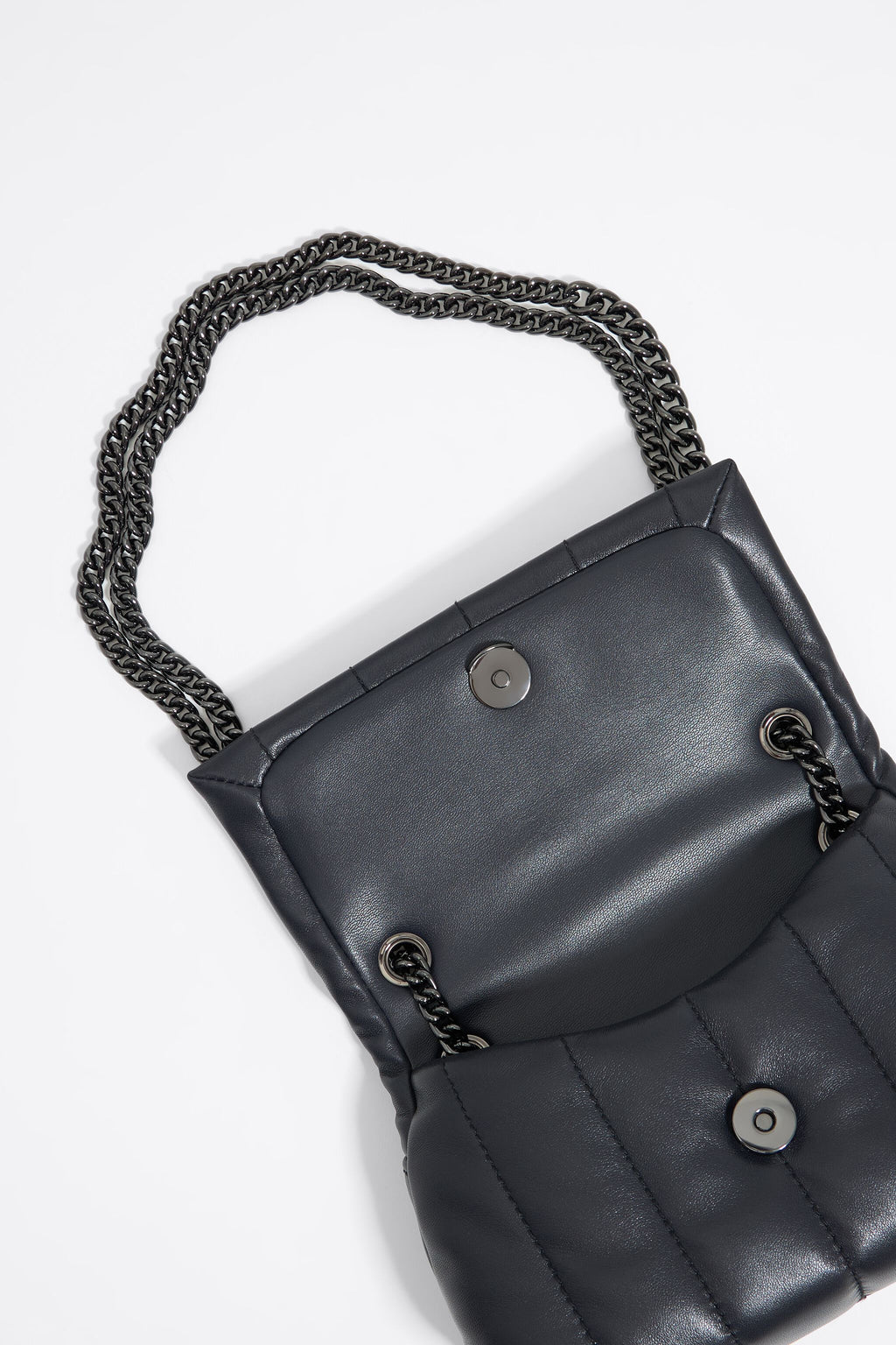 Mini black leather flap bag