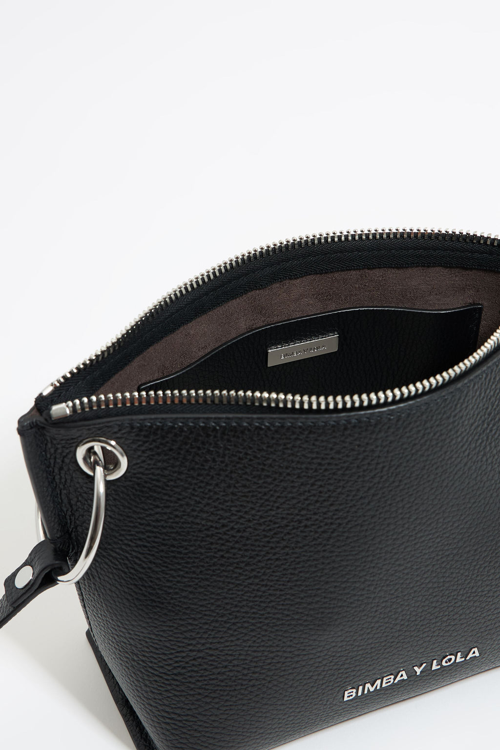 Medium black leather trapezium bag