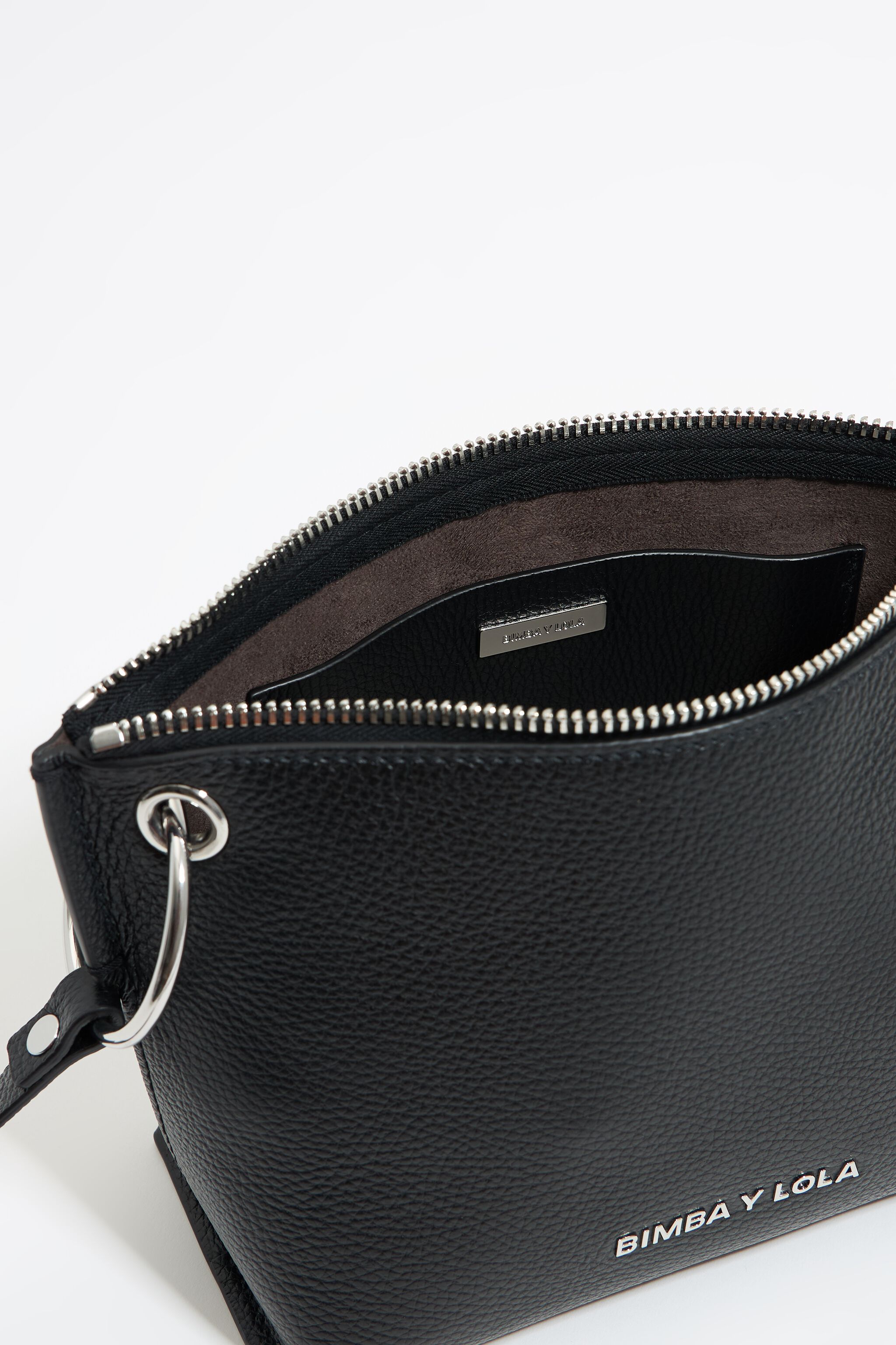 Medium black leather trapezium bag