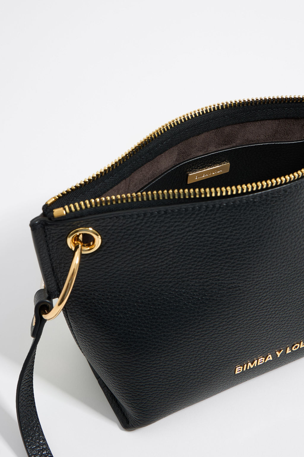 Medium black leather trapezium bag