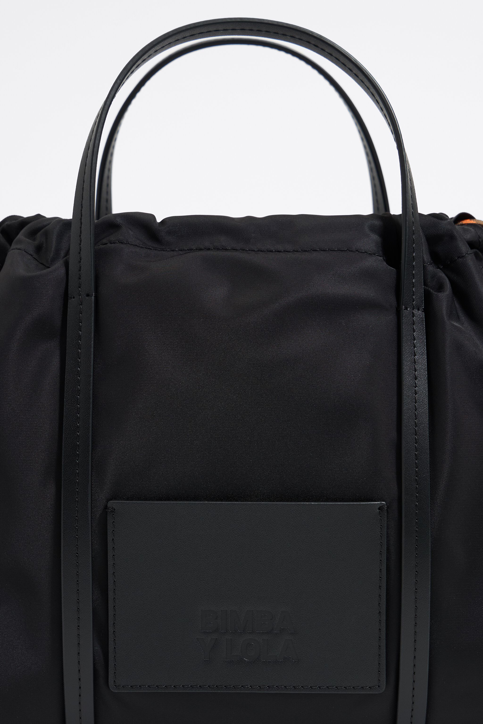 Small black nylon crossbody bag