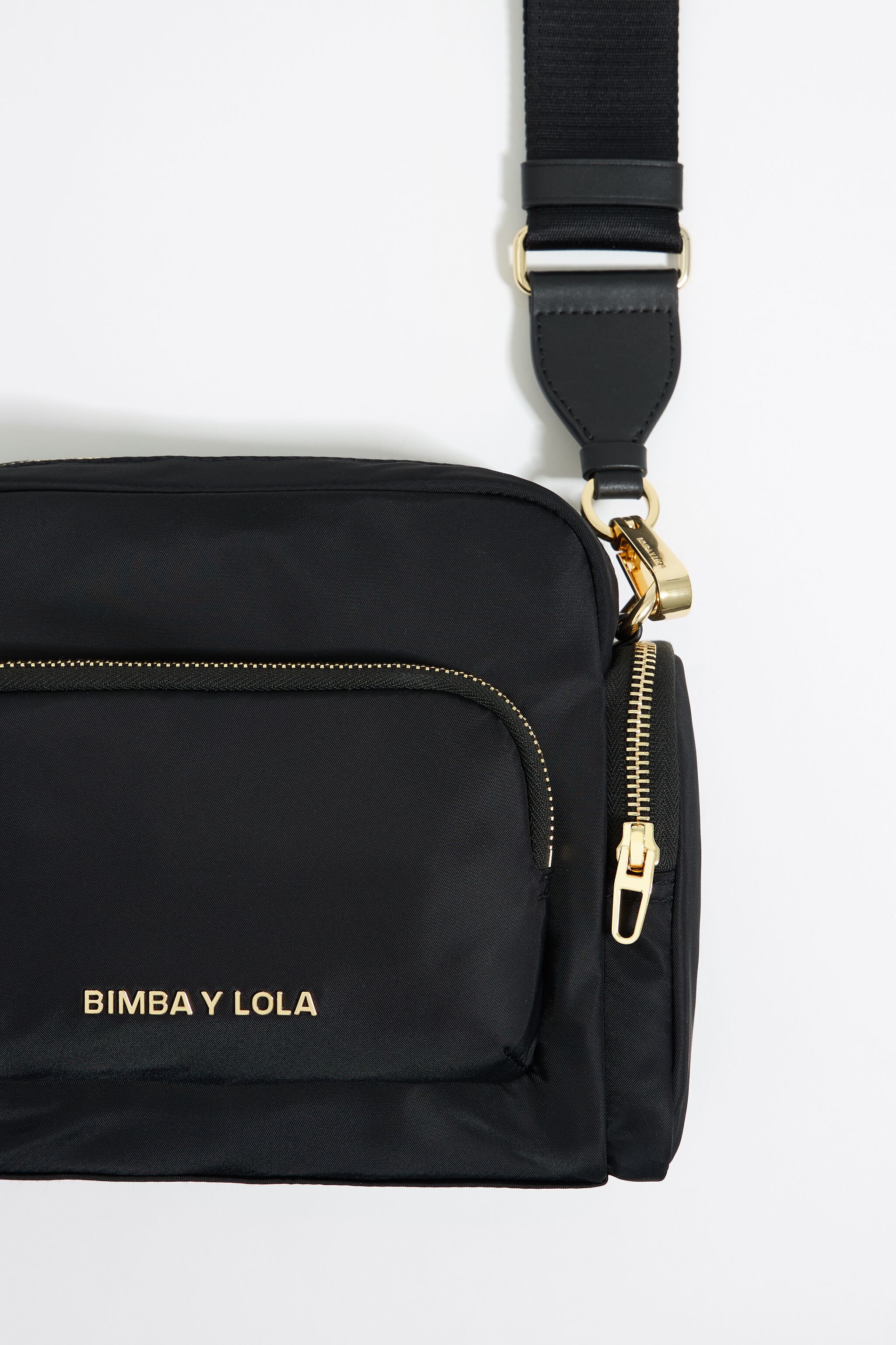 Medium black multi-pocket crossbody bag