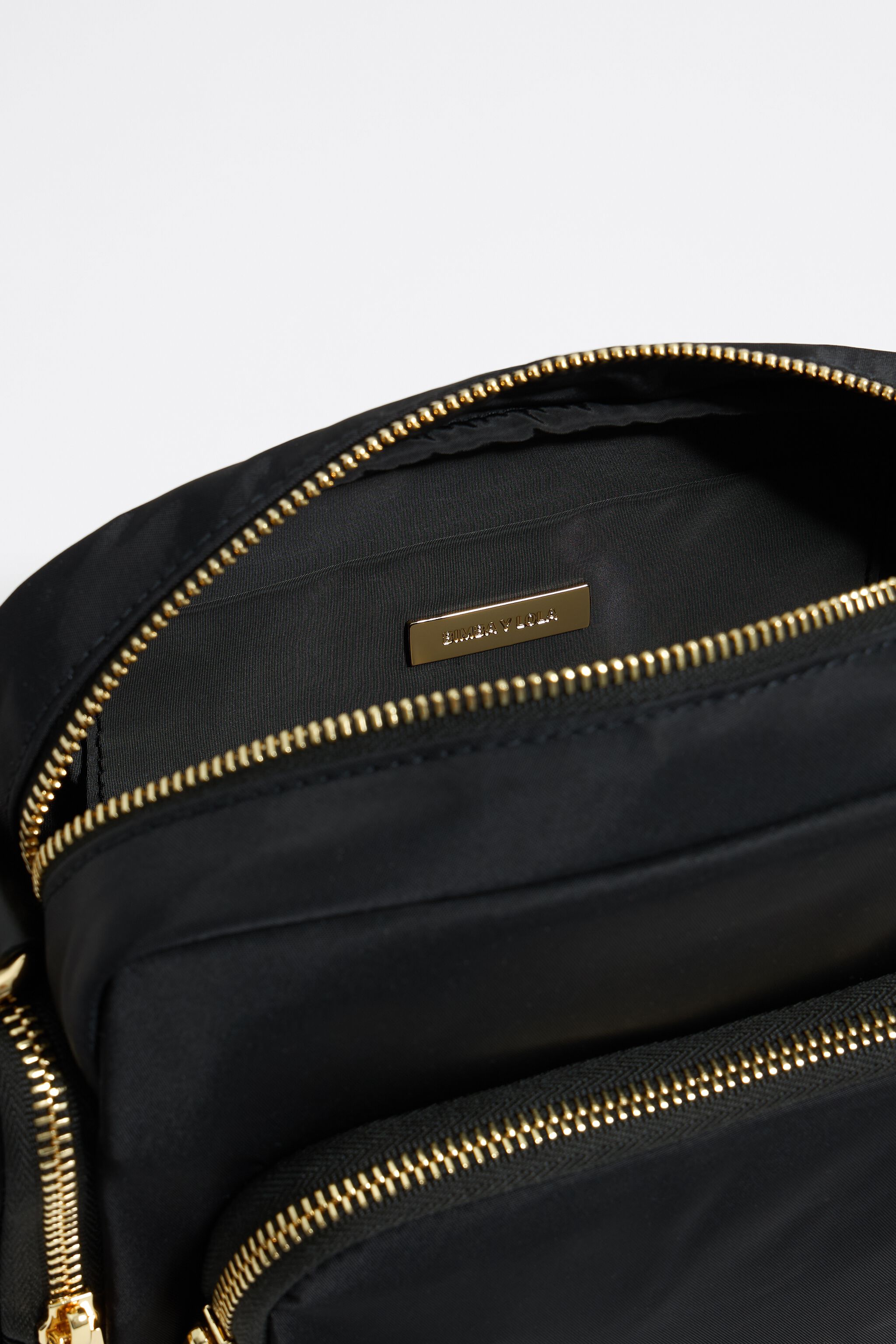 Medium black multi-pocket crossbody bag