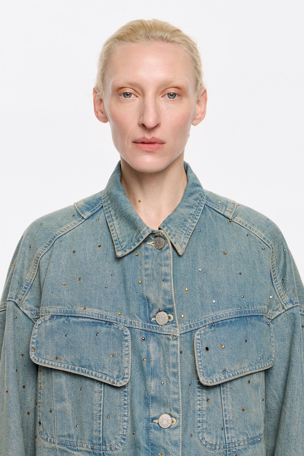 Light blue denim jacket with stones
