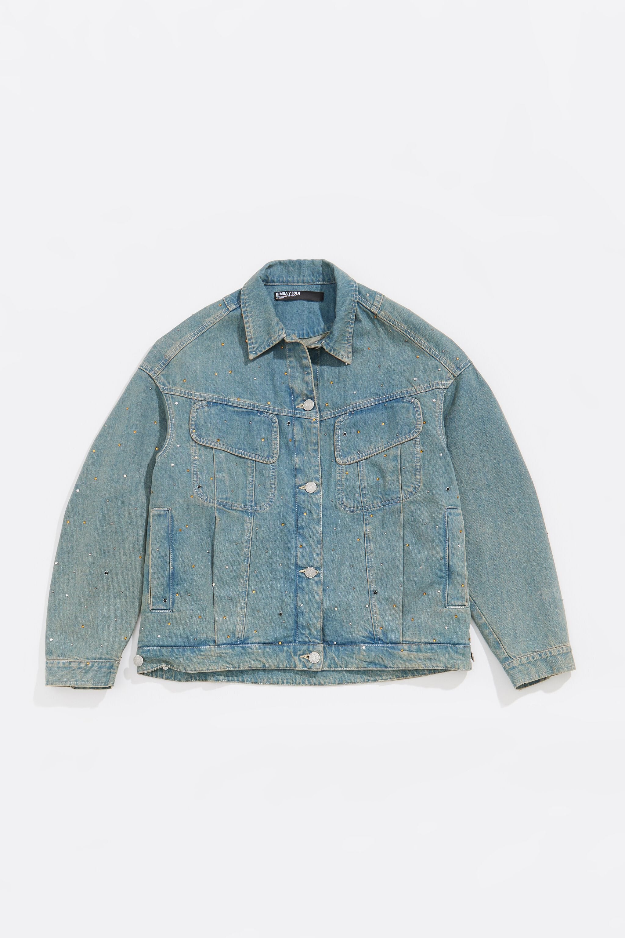 Light blue denim jacket with stones