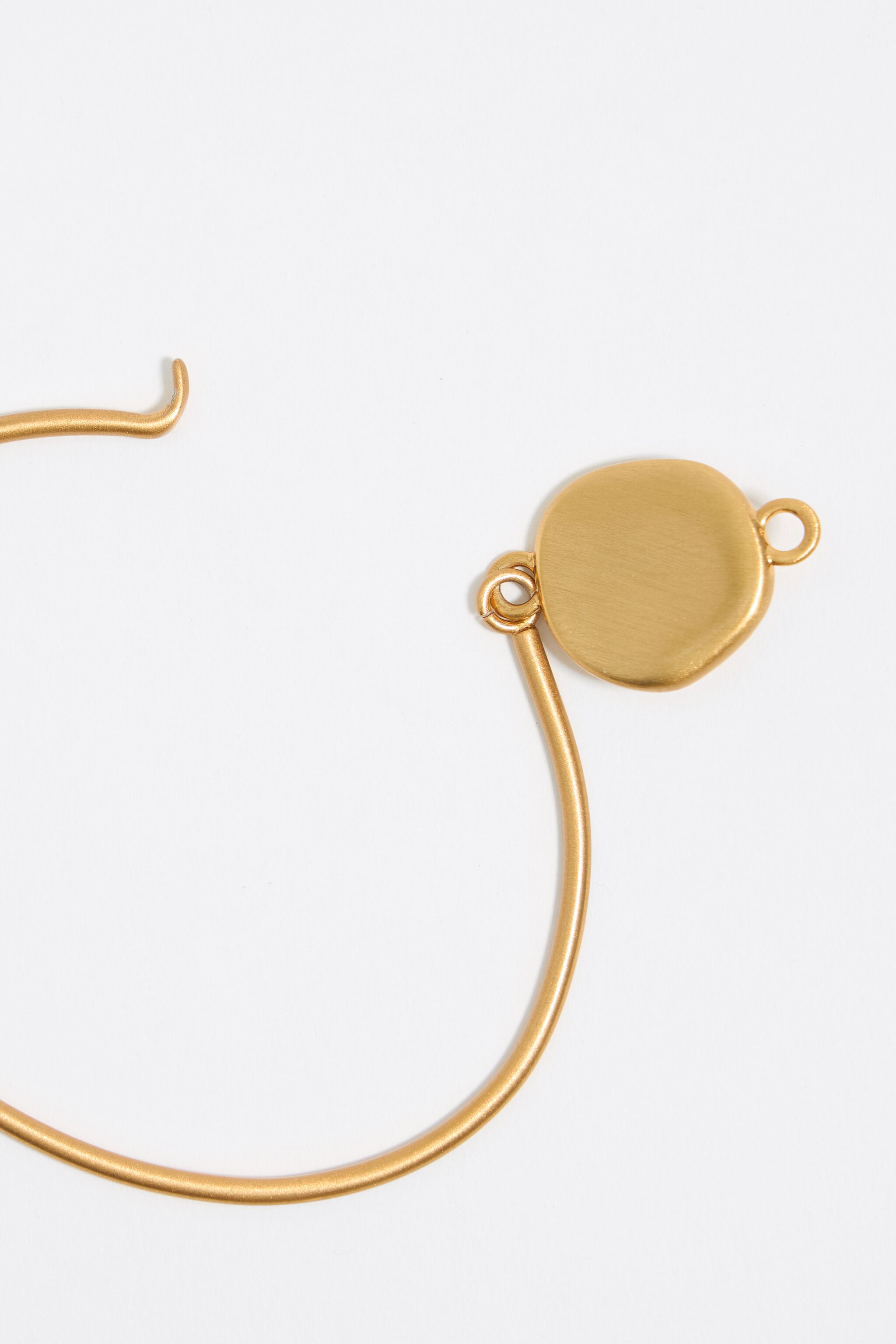 Ivory coin logo bracelet