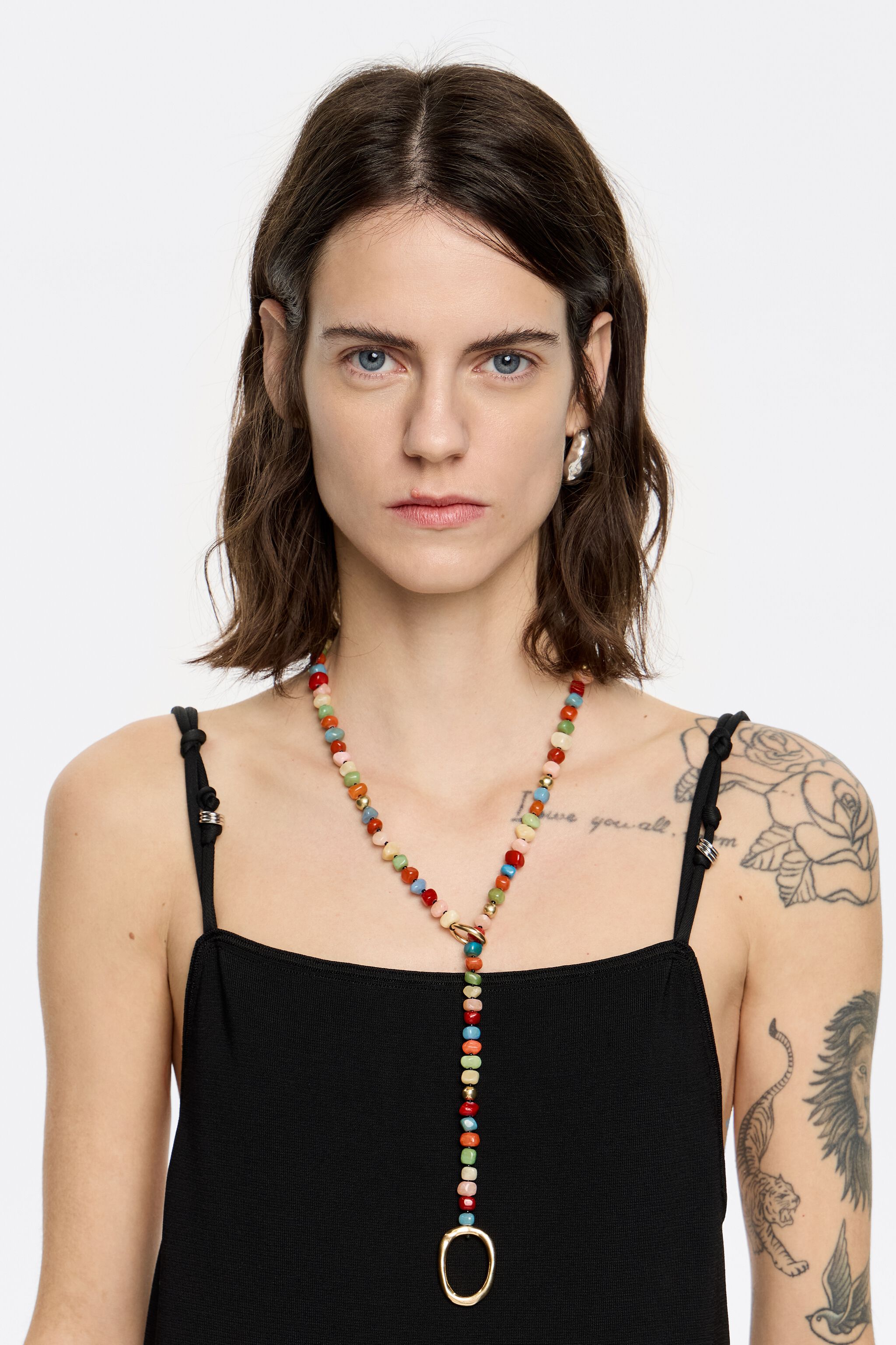 Multicolor stones and gold ring necklace