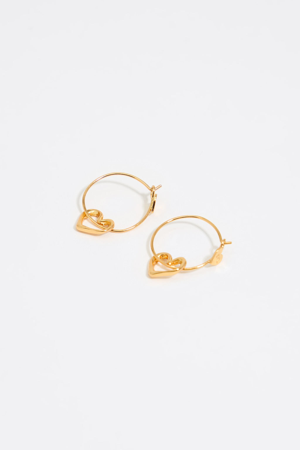 Textured gold heart hoop earrings