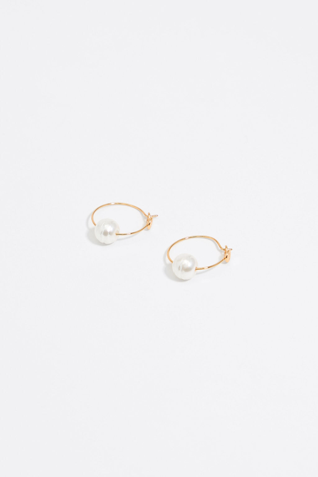 Small gold hoop pearl earrings