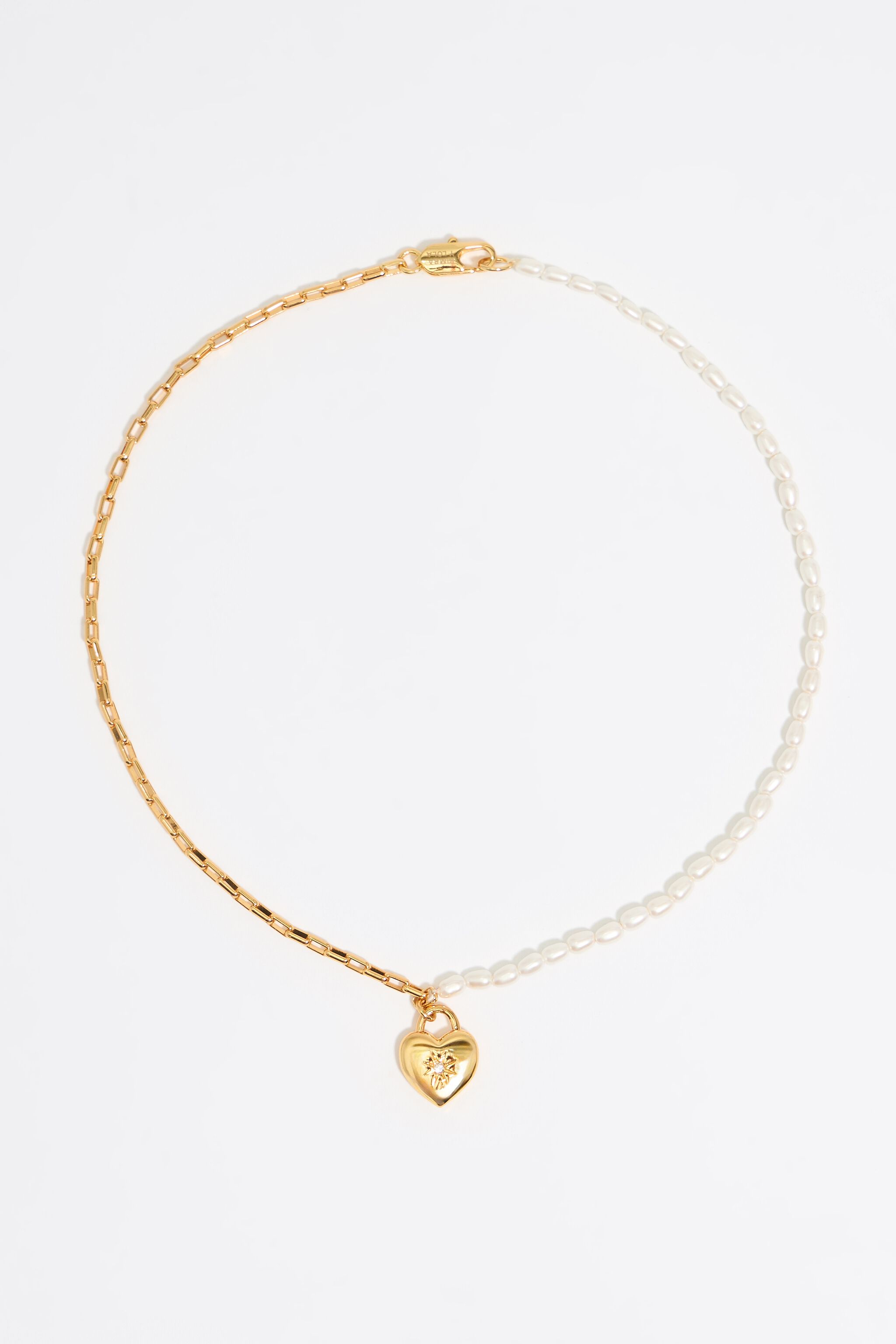 Gold chain and pearl heart necklace