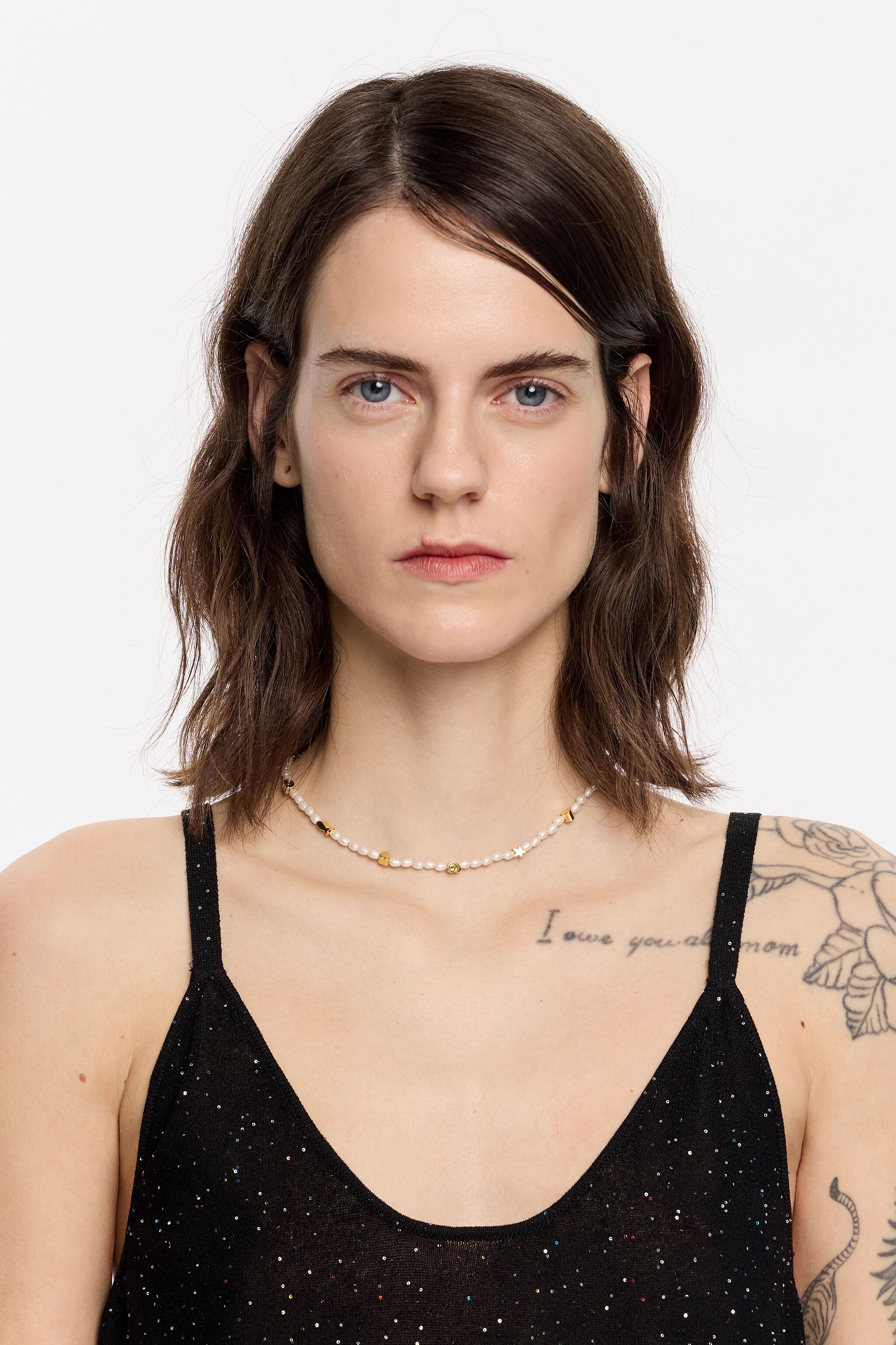 Gold marine motifs and pearl necklace