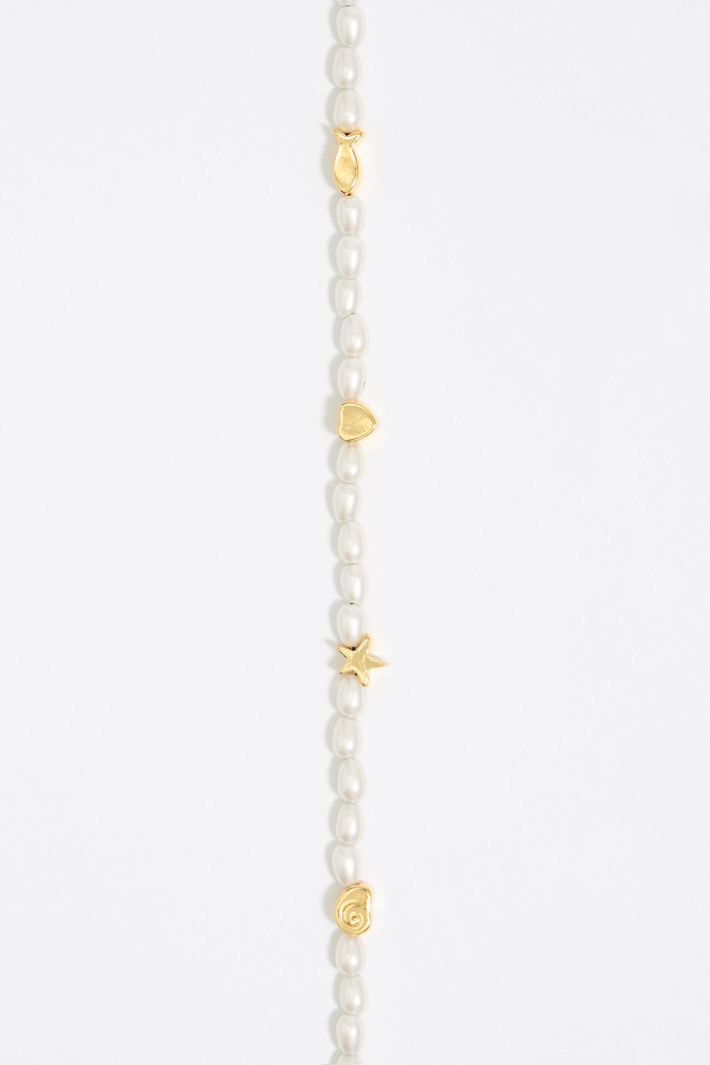 Gold marine motifs and pearl necklace