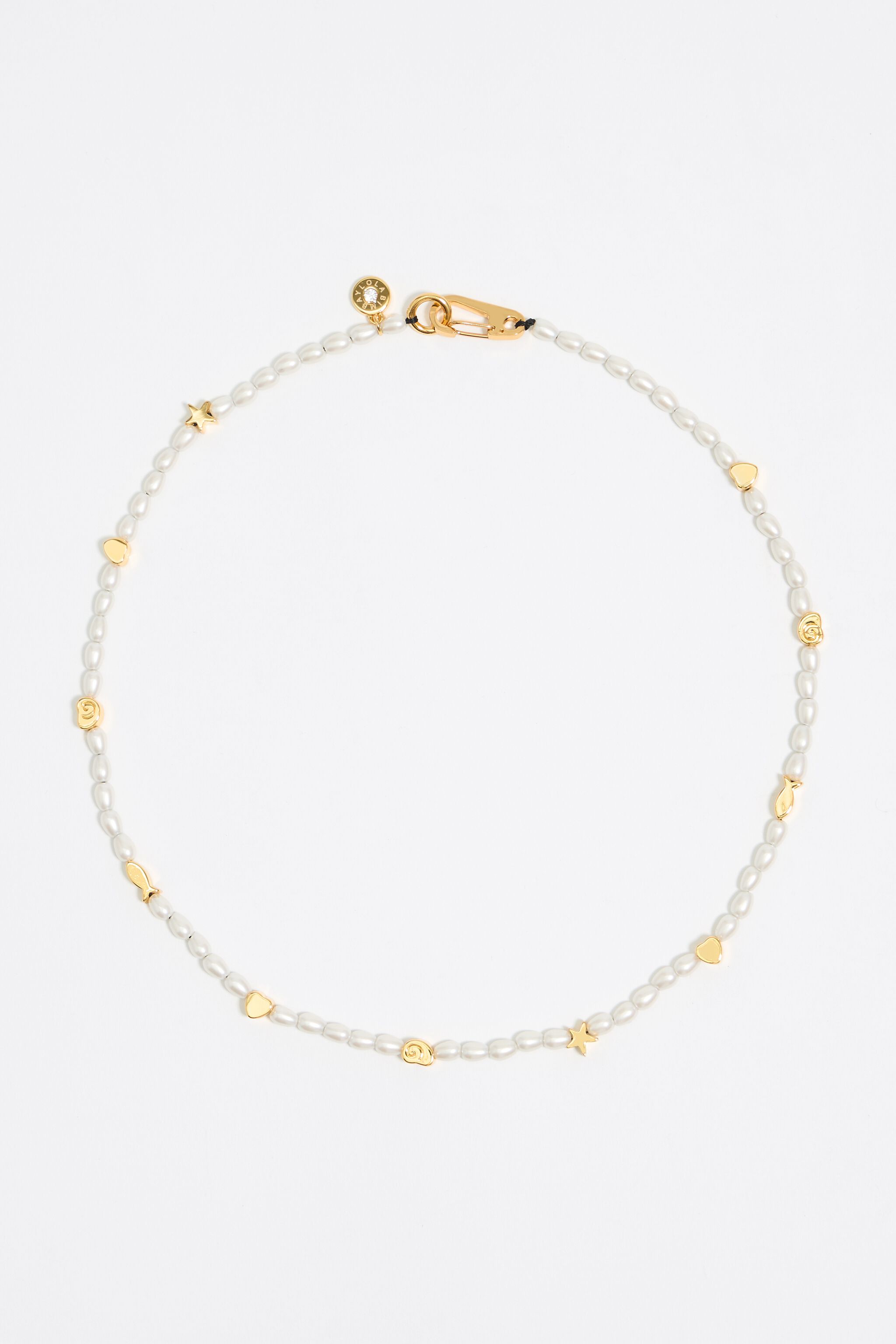 Gold marine motifs and pearl necklace
