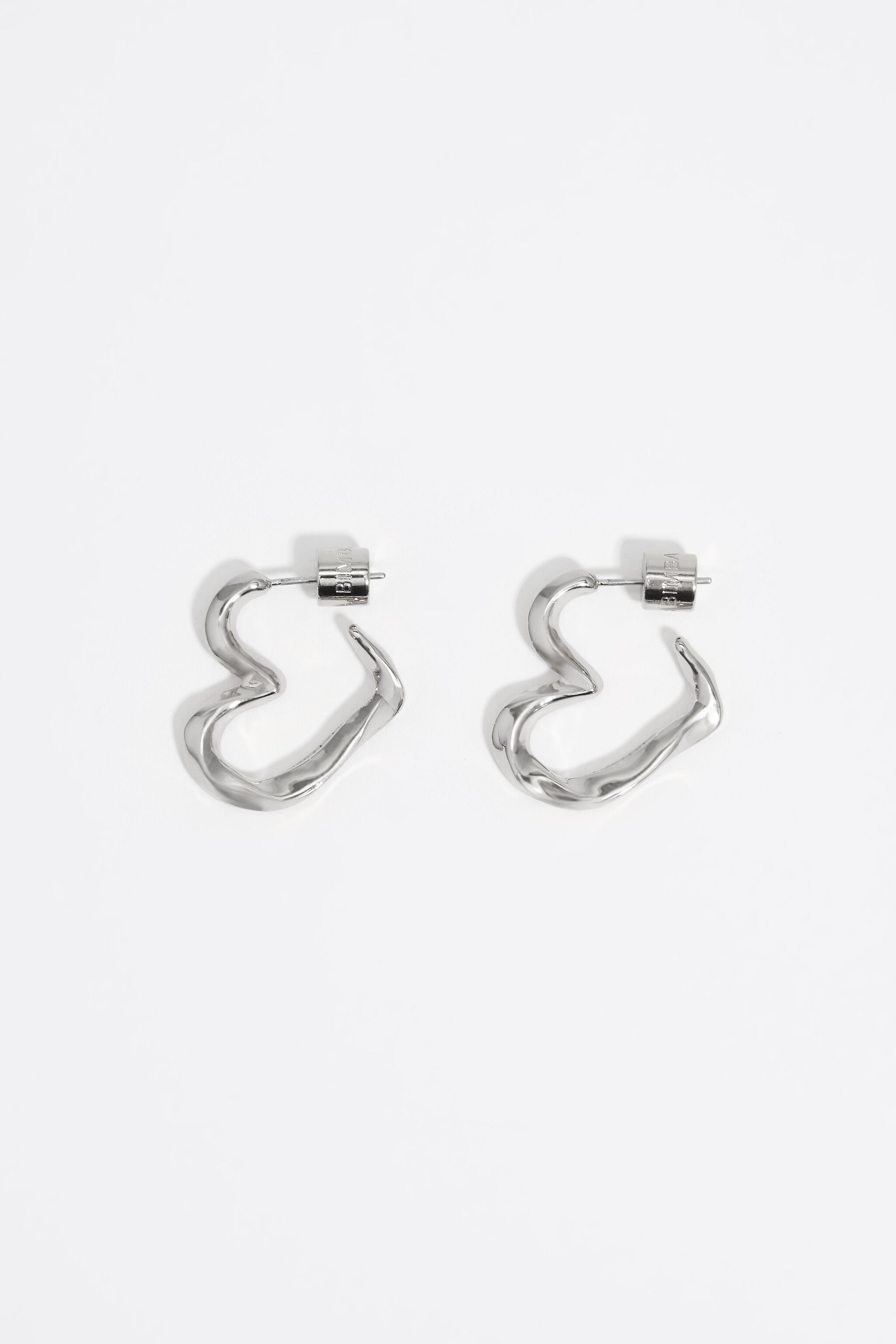 Textured silver heart hoop earrings