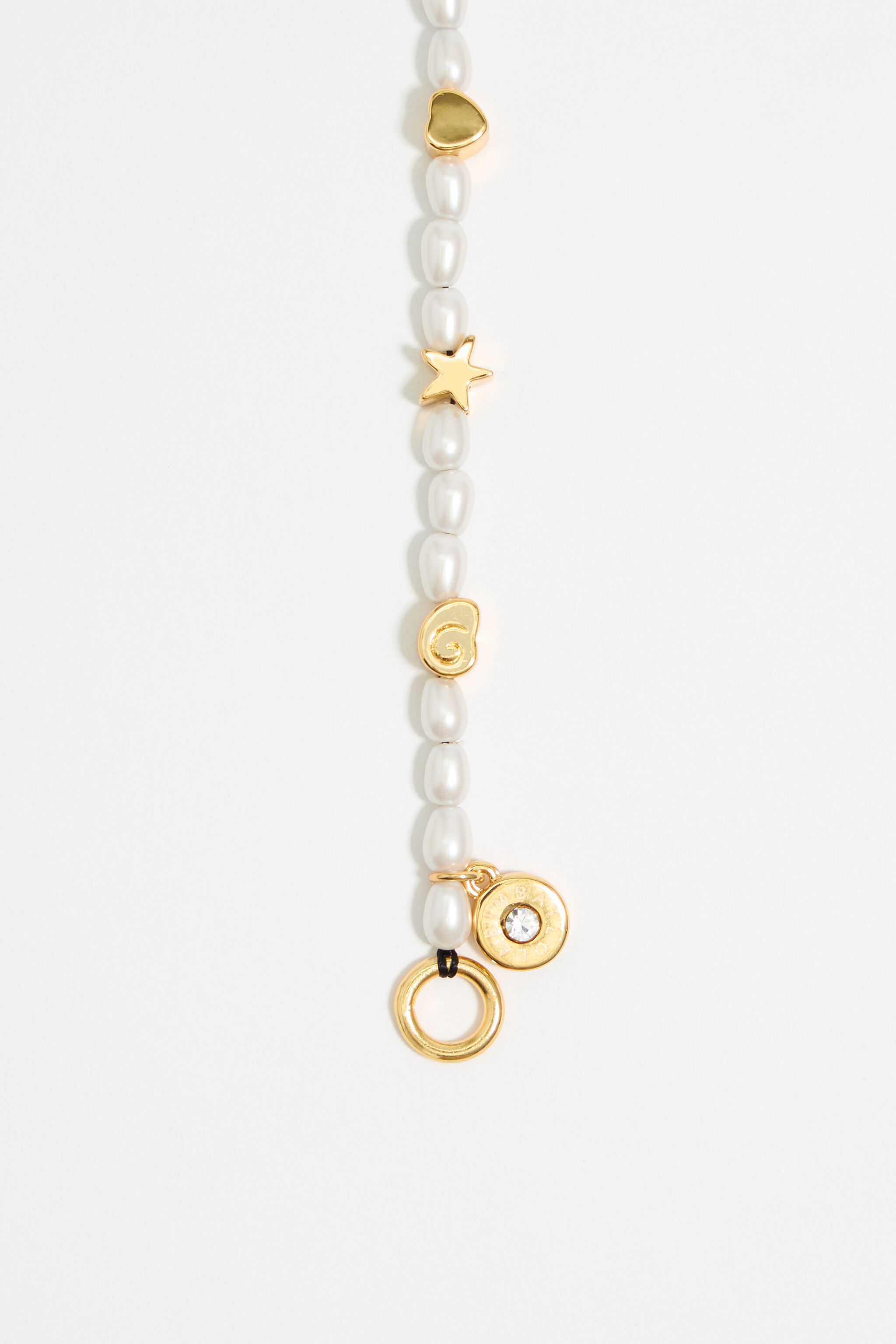 Gold marine motifs and pearl bracelet
