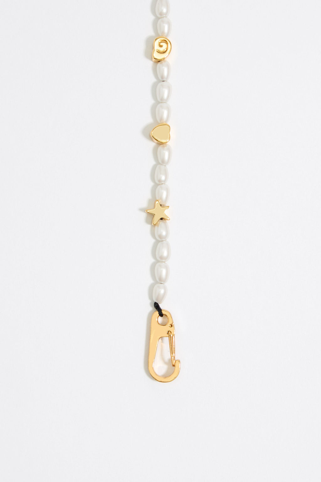 Gold marine motifs and pearl bracelet