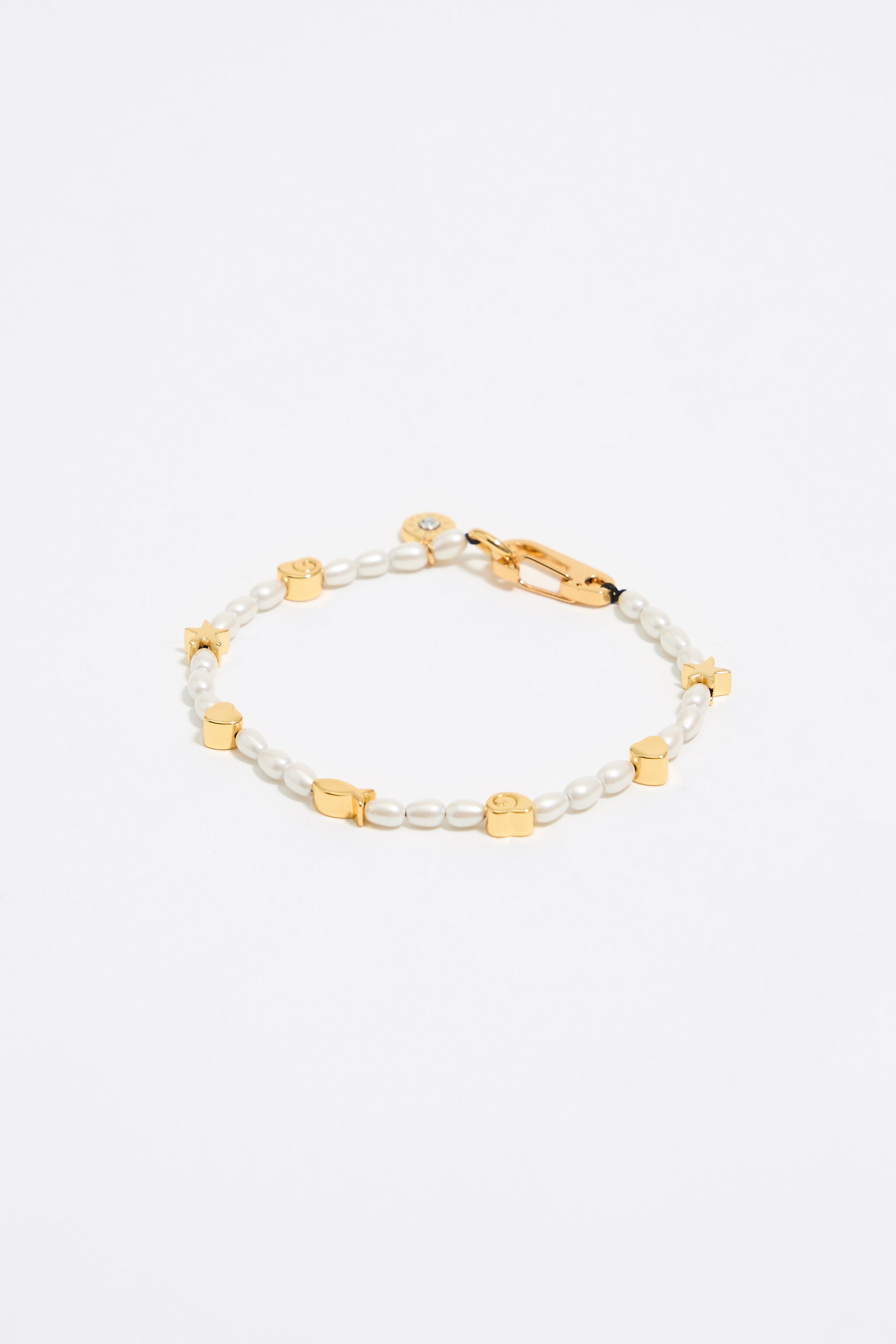Gold marine motifs and pearl bracelet