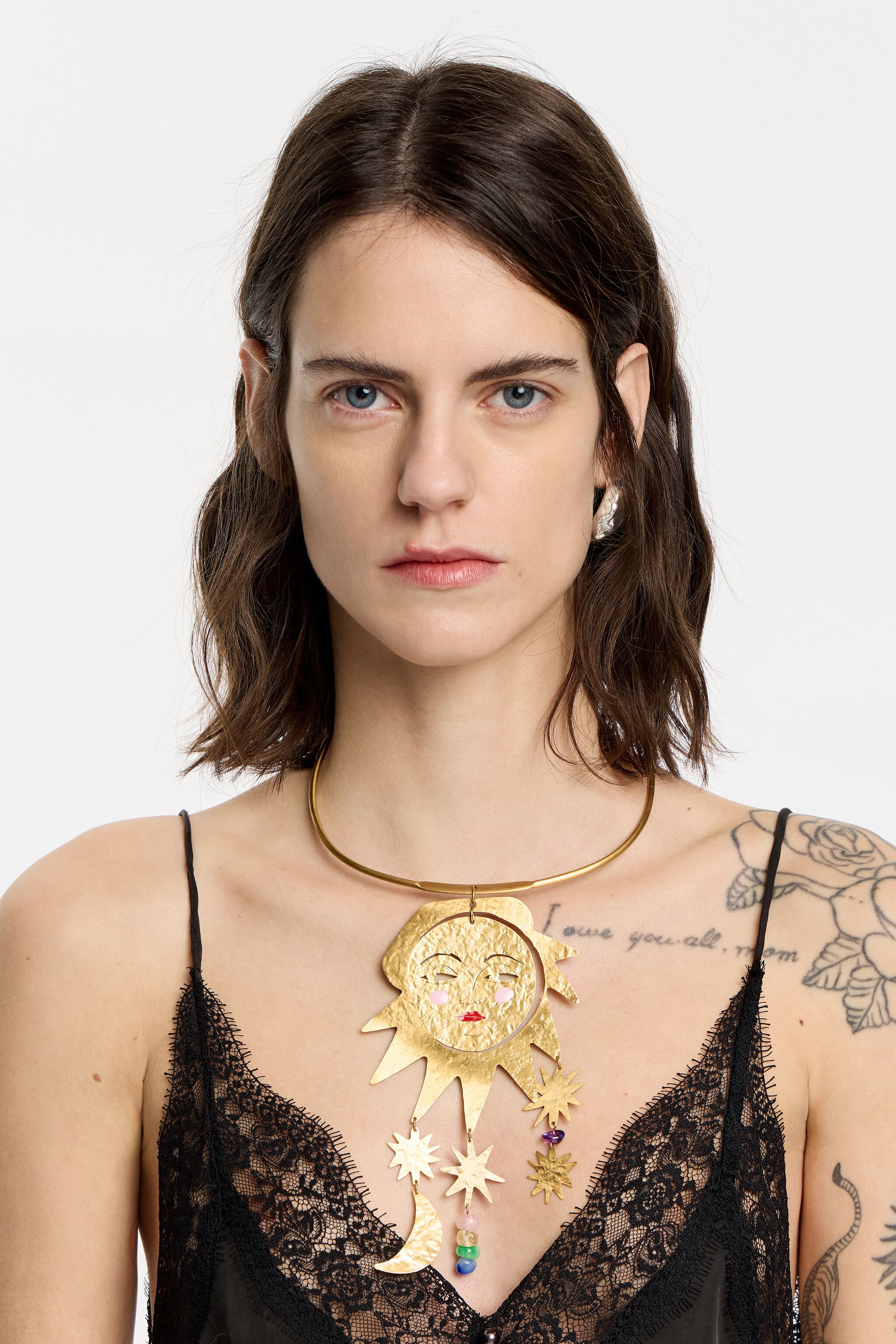 Gold sun and moon necklace