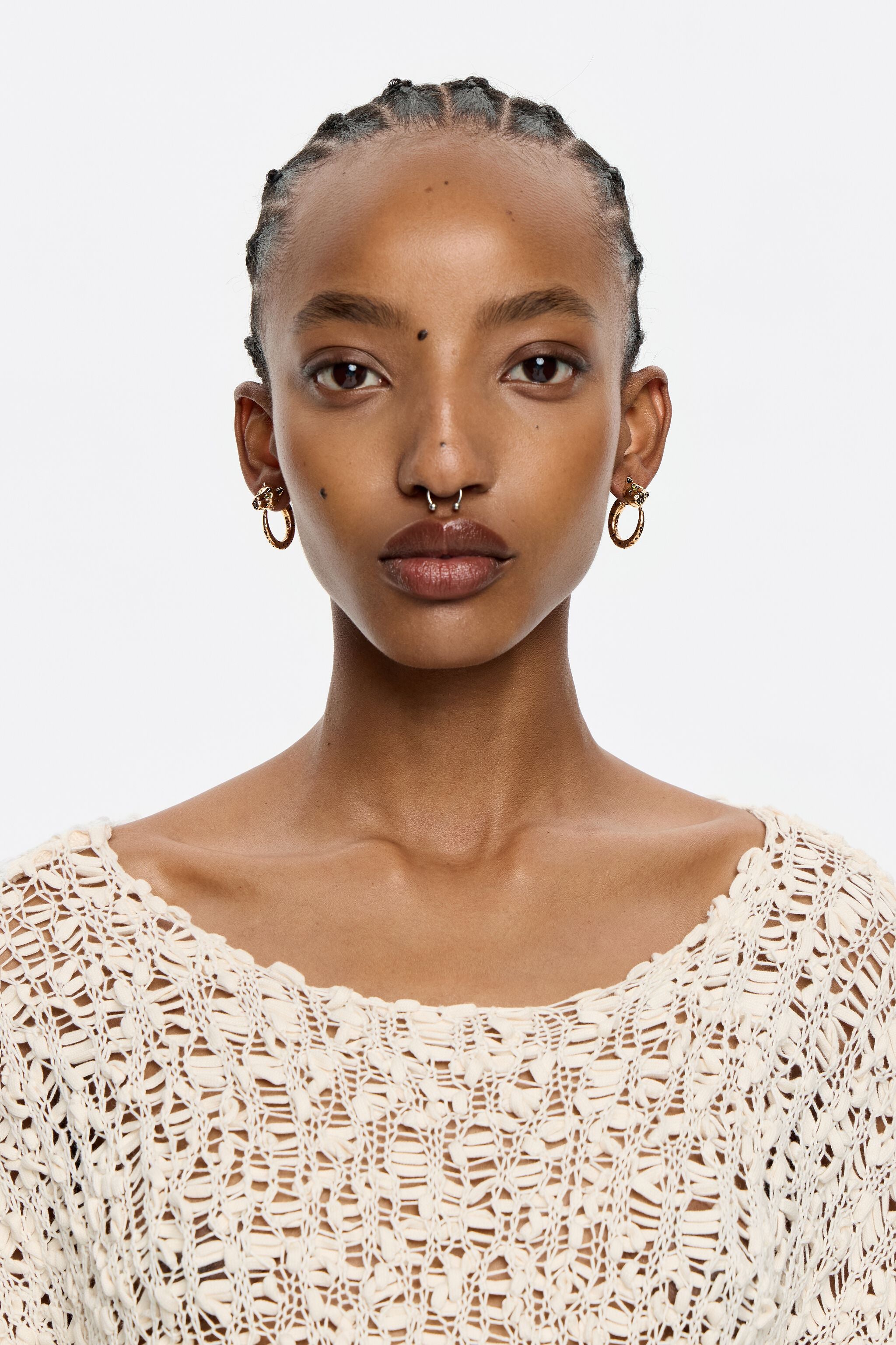 Gold and black panther hoop earrings