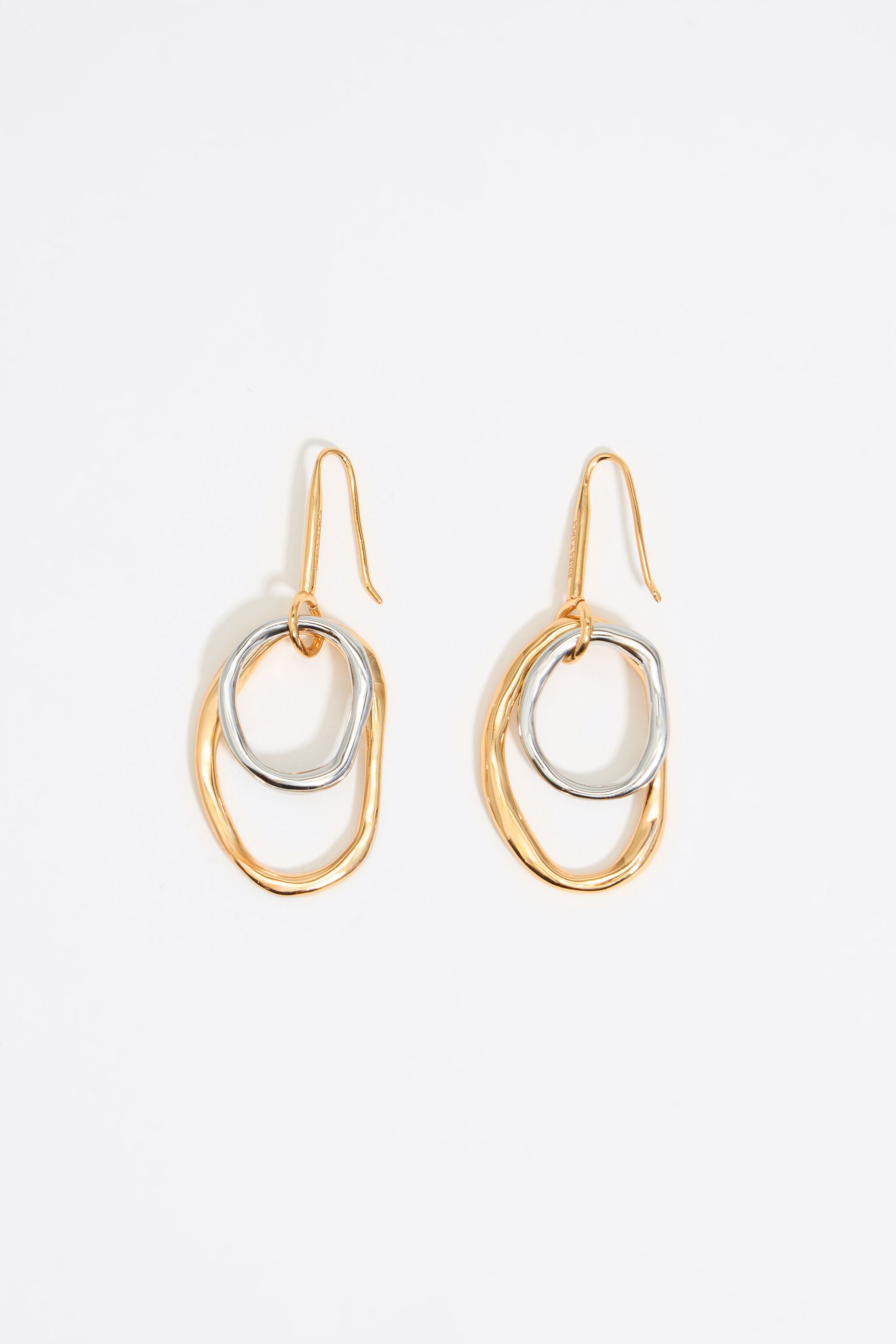 Textured gold and silver hoop earrings