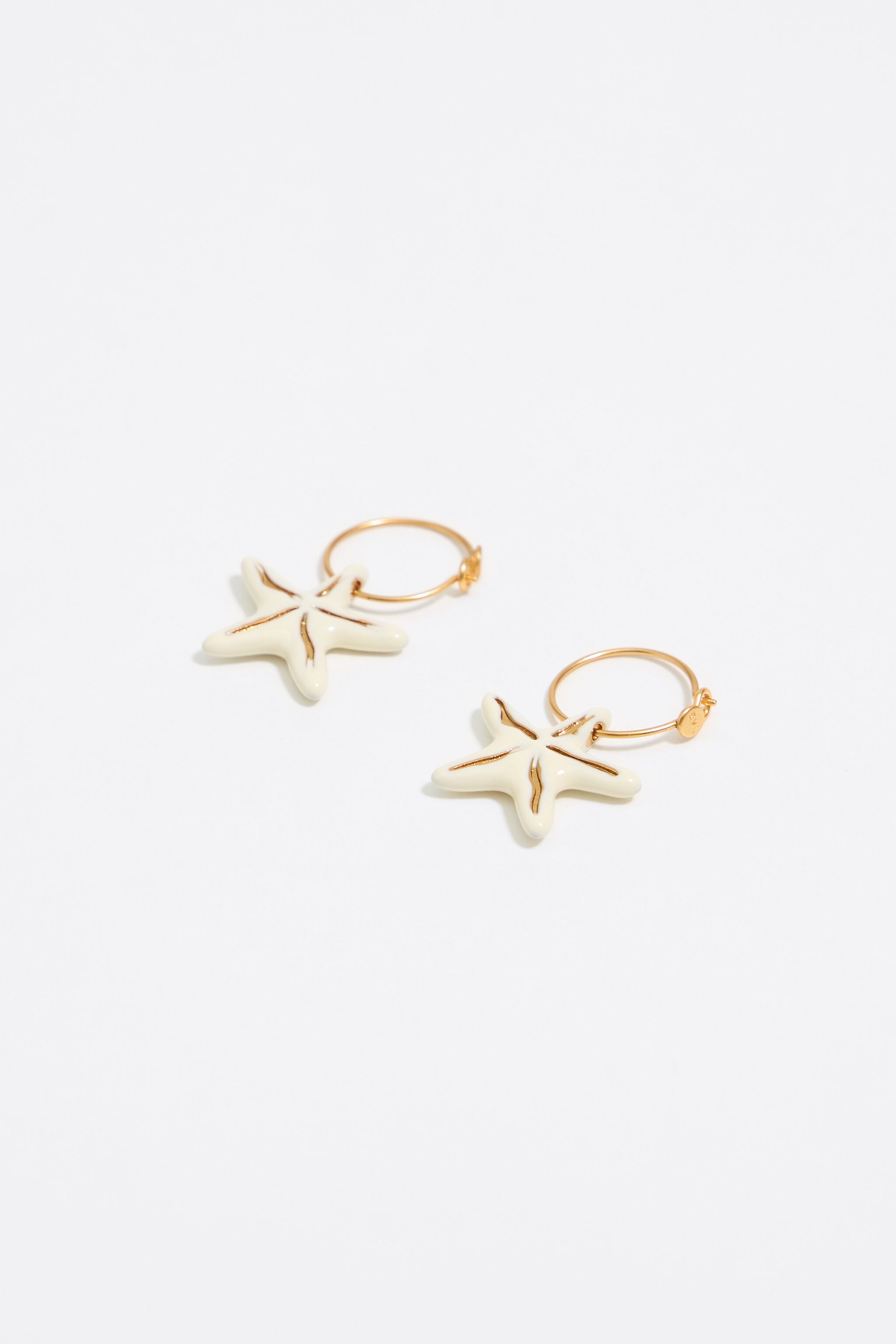 Ivory stars hoop earrings