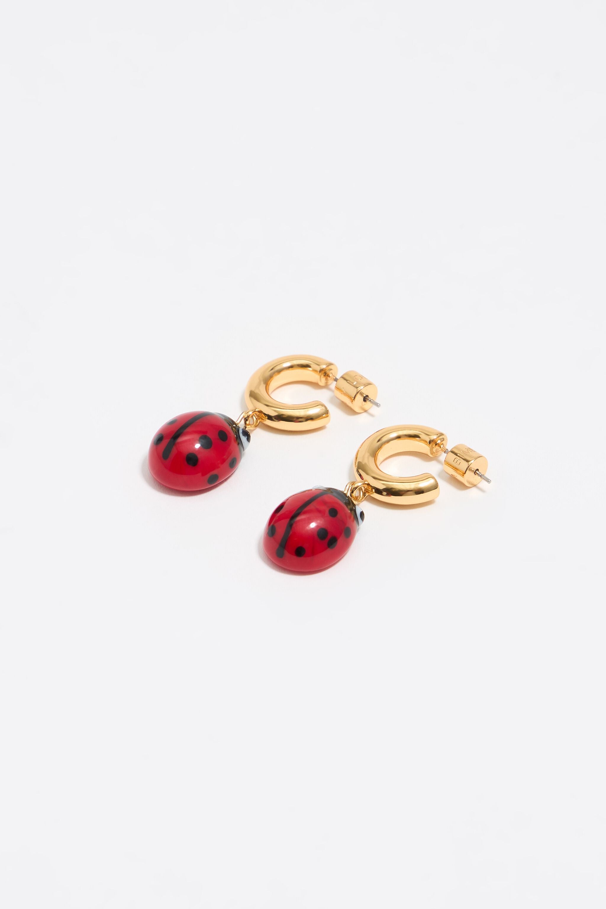 Red crystal ladybug hoop earrings