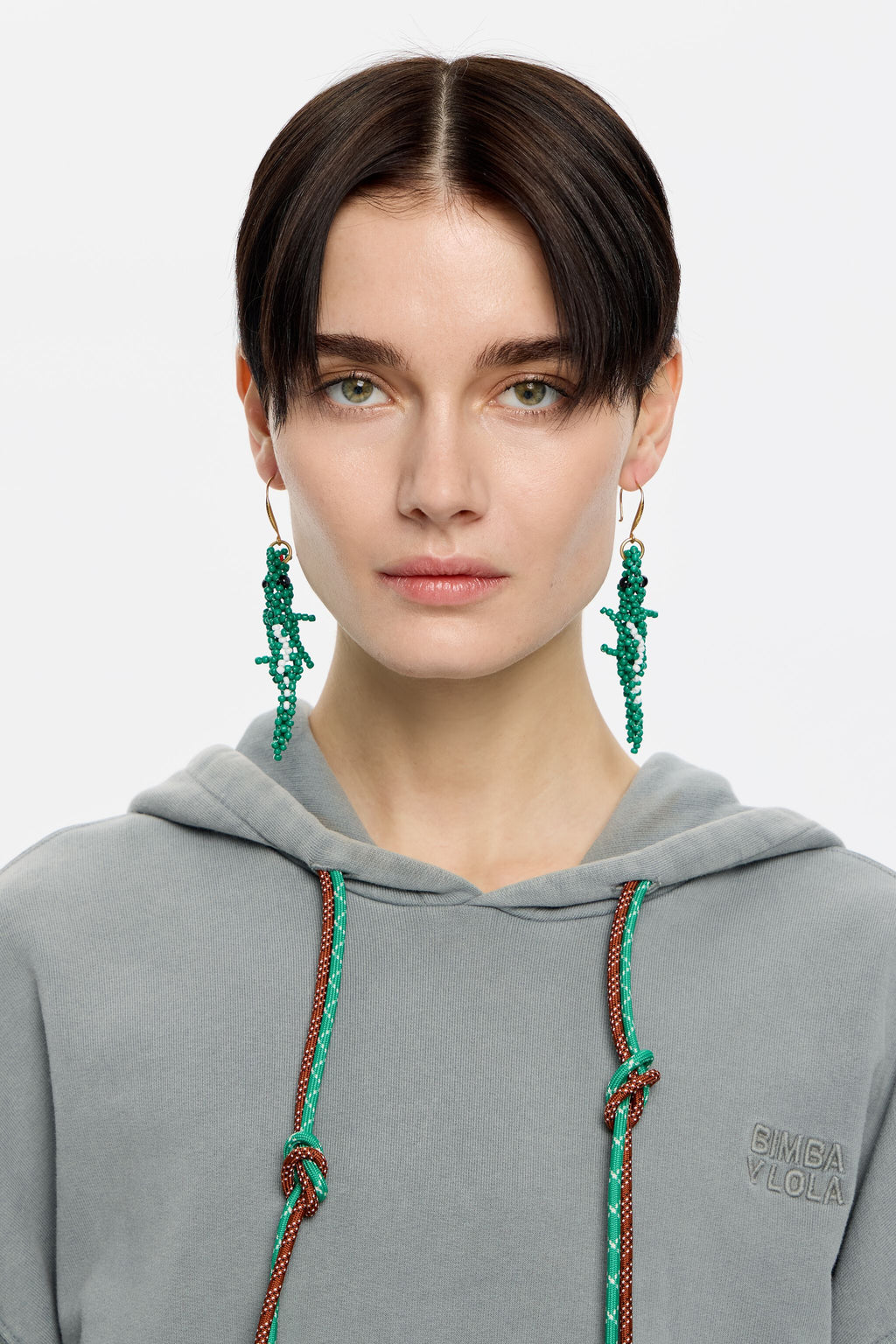 Green beaded crocodile earrings